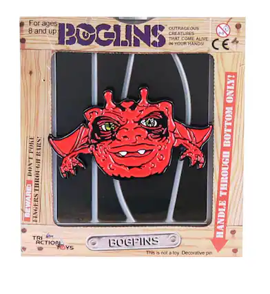 For ages 8 and up
BOGINS
OUTRAGEOUS CREATURES THAT COME ALIVE IN YOUR HANDS!
BEWARE: FINGERS THROUGH FINGERS!
HANDLE THROUGH BOTTOM ONLY!
This is not a toy. Decorative pin.
TRI ACTION TOYS