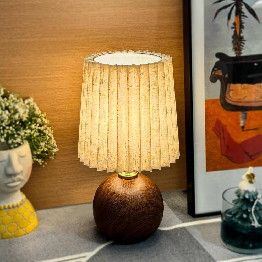 Front. RTMB - Modern Small Pleated Table Lamp with Ceramic Wood Base and Flaxen Shade.