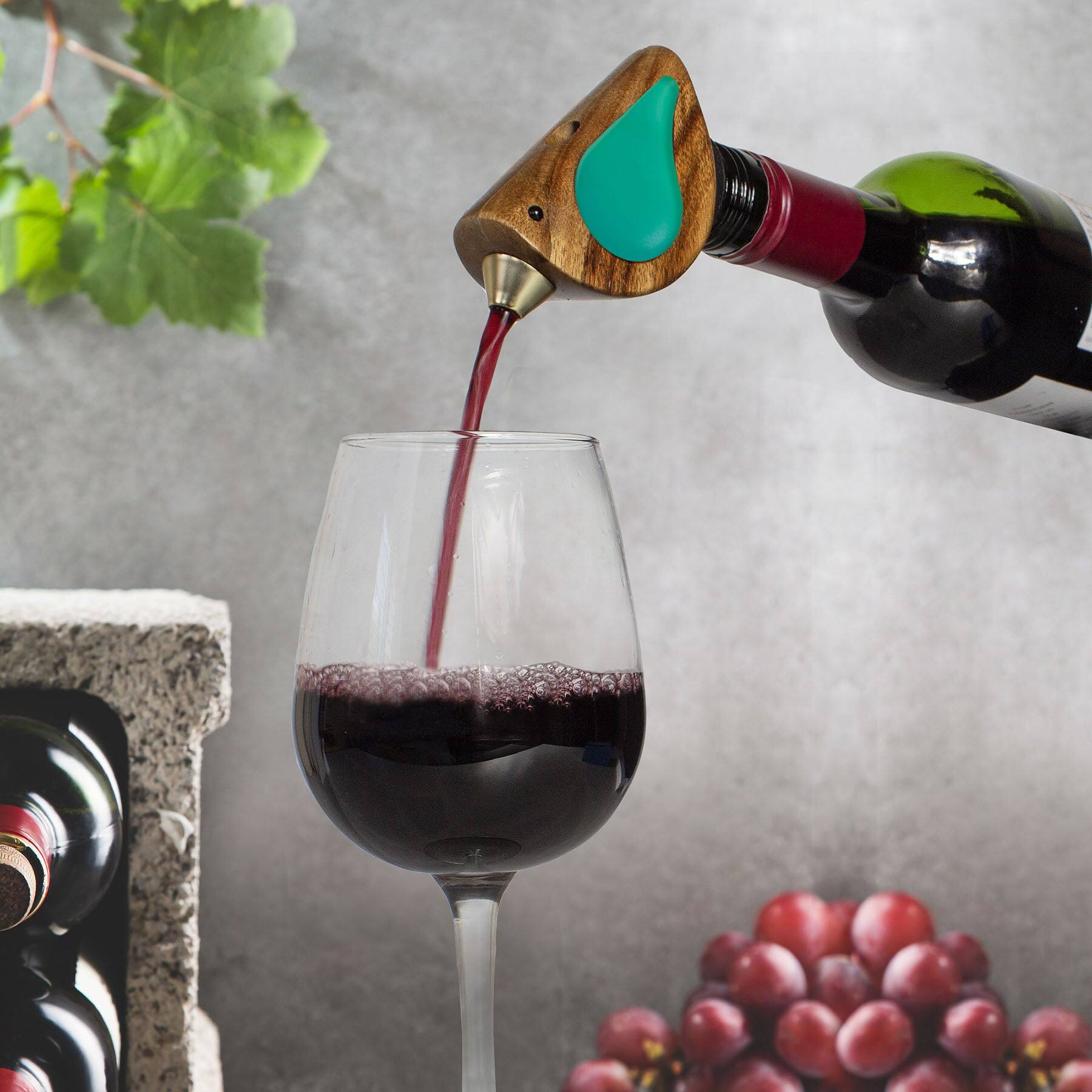 Left. Songbird Specialties - "Singing" Wine Bottle Pourer, Turquoise - Brown, Turquoise.