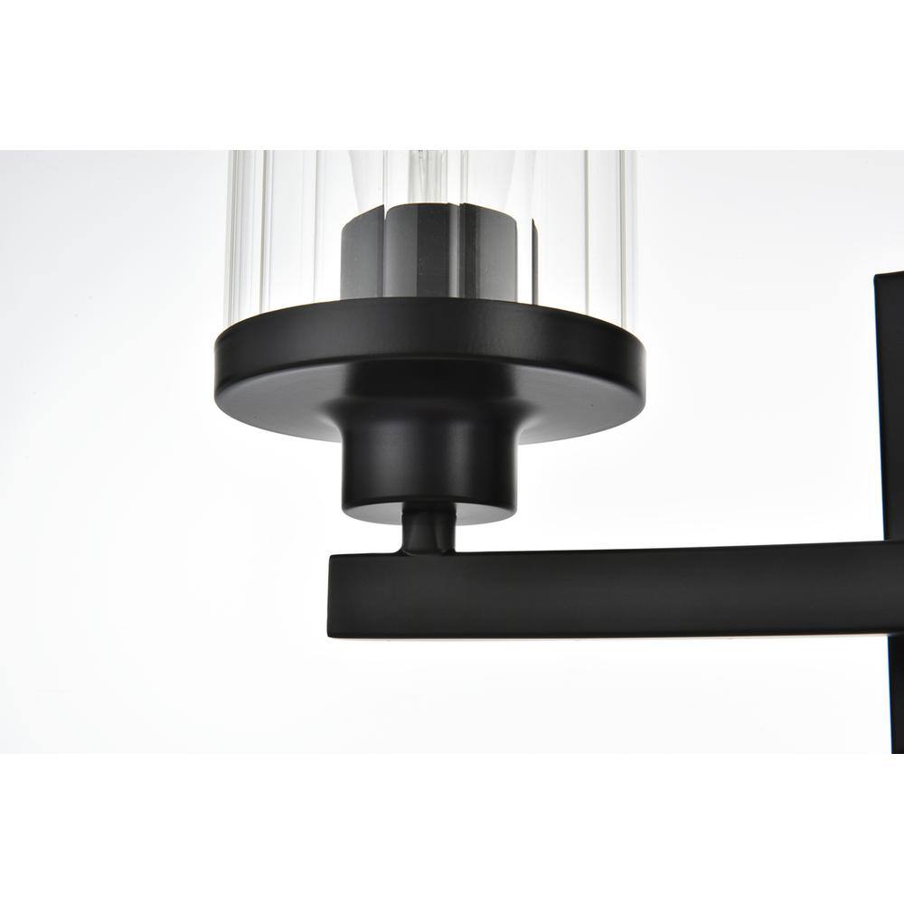 Left. Living District - Saanvi 3 light Black and Clear Bath Sconce - Black And Clear.