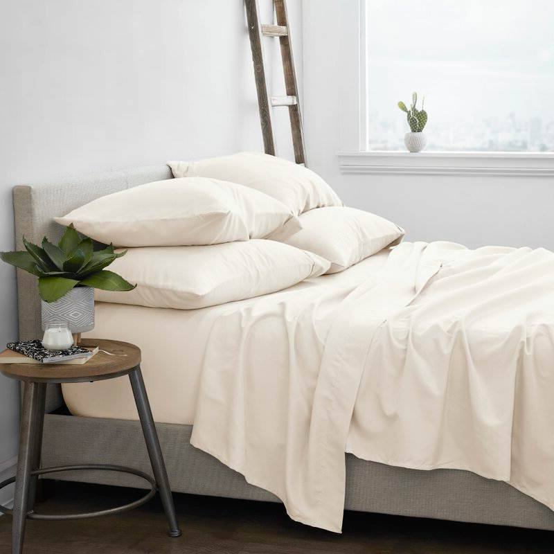 Angle. SlickBlue - Wrinkle-Resistant Microfiber/Polyester Sheet Set for Easy Care Bedding - Ivory.