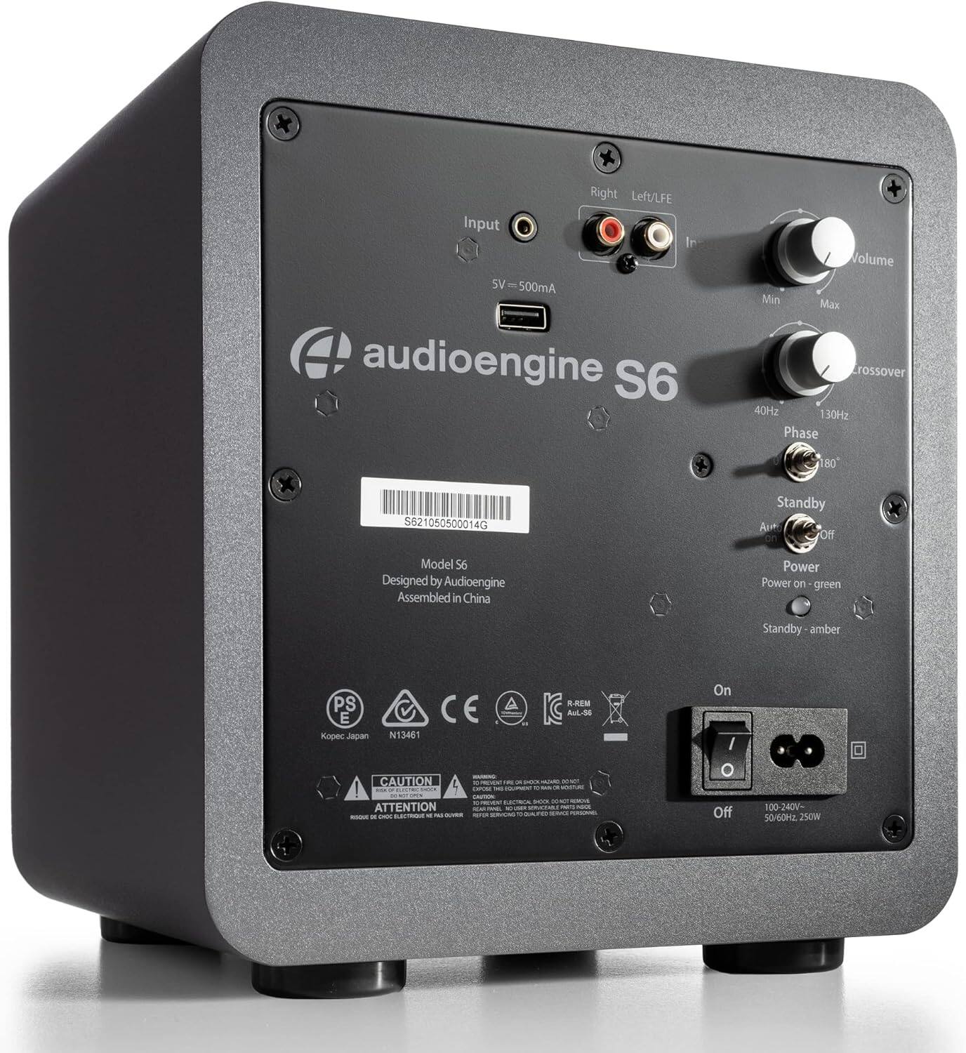 Sure, here is the corrected and grouped text from the image:

---

**audioengine S6**

**Input**  
5V = 500mA

**Right Left/LFE**  
Input

**Volume**  
Min Max

**Crossover**  
40Hz 30Hz

**Phase**  
80°

**Standby**  
Au on Off

**Power**  
Power on - green  
Standby - amber

**Model S6**  
Designed by Audioengine  
Assembled in China

**PS**  
Kopec Japan  
N13461

**CAUTION**  
ATTENTION

**On**  
Off

**100-240V~ 50/60Hz 250W**

**Barcode**  
S621050500014G

**CE**  
R-REM  
AuL-30

**Power**  
Power on - green  
Standby - amber

**Input**  
5V = 500mA

**Right Left/LFE**  
Input

**Volume**  
Min Max

**Crossover**  
40Hz 30Hz

**Phase**  
80°

**Standby**  
Au on Off

**Power**  
Power on - green  
Standby - amber

**Model S6**  
Designed by Audioengine  
Assembled in China

**PS**  
Kopec Japan  
N13461

**CAUTION**  
ATTENTION

**On**  
Off

**100-240V~ 50/60Hz 250W**

---
