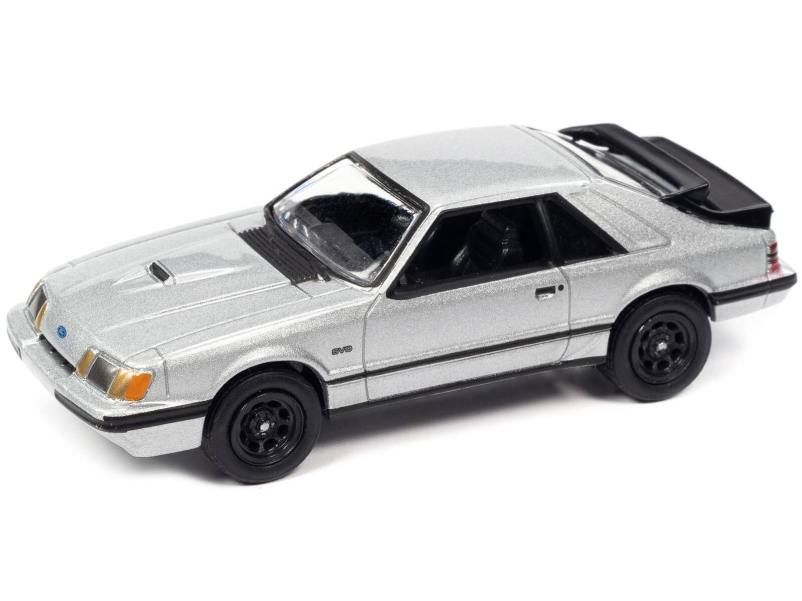 Alt View 1. Johnny Lightning - 1986 Ford Mustang SVO Silver Metallic with Black Stripes Limited Edition to 12768 pcs 1/64 Model Car by Johnny Lightning.