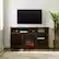 Alt View 3. Walker Edison - 58" Tall Glass Two Door Soundbar Storage Fireplace TV Stand for Most TVs Up to 65" - Traditional Brown.