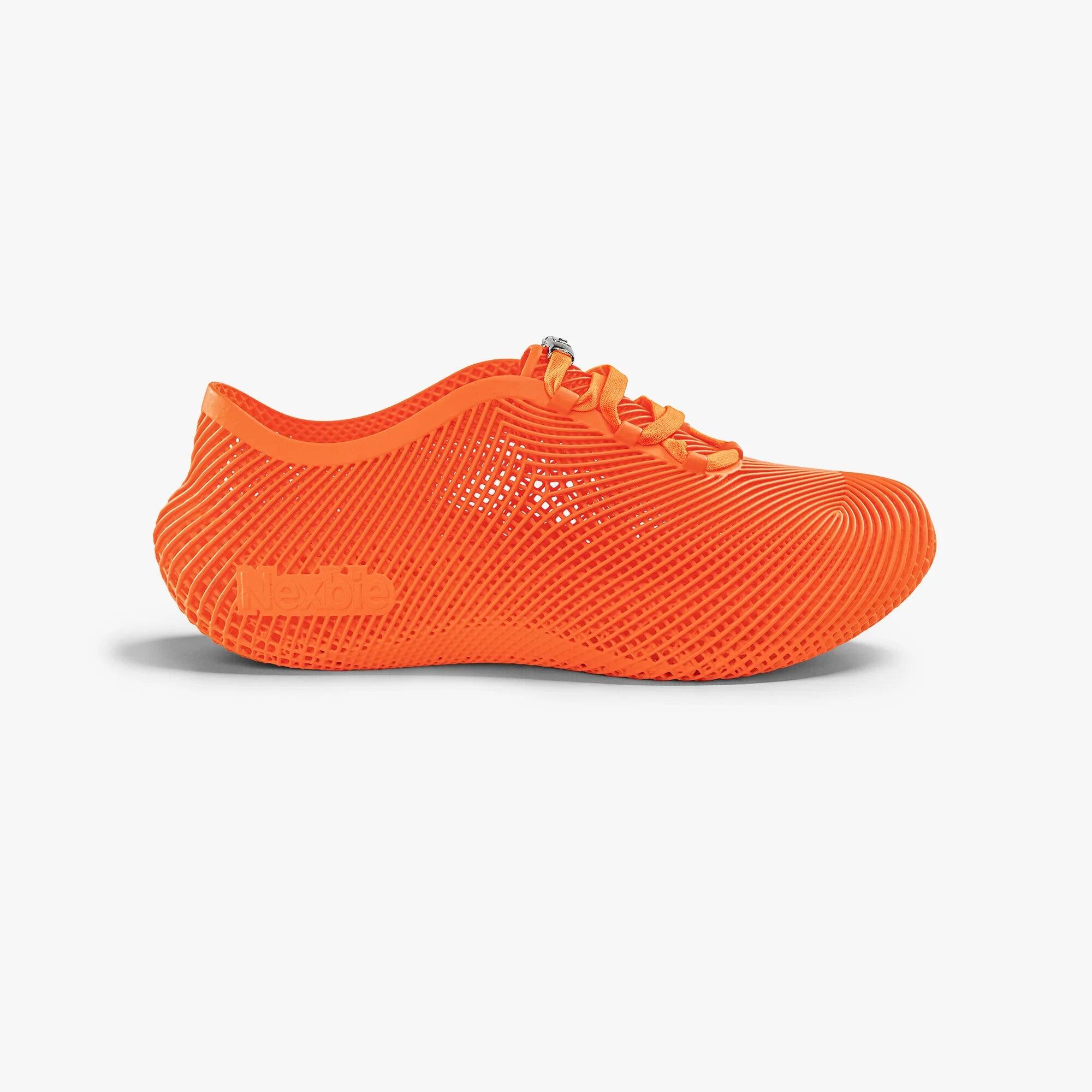 Angle. Nexbie - Aeroraise 3D Printed Sneakers - Orange.