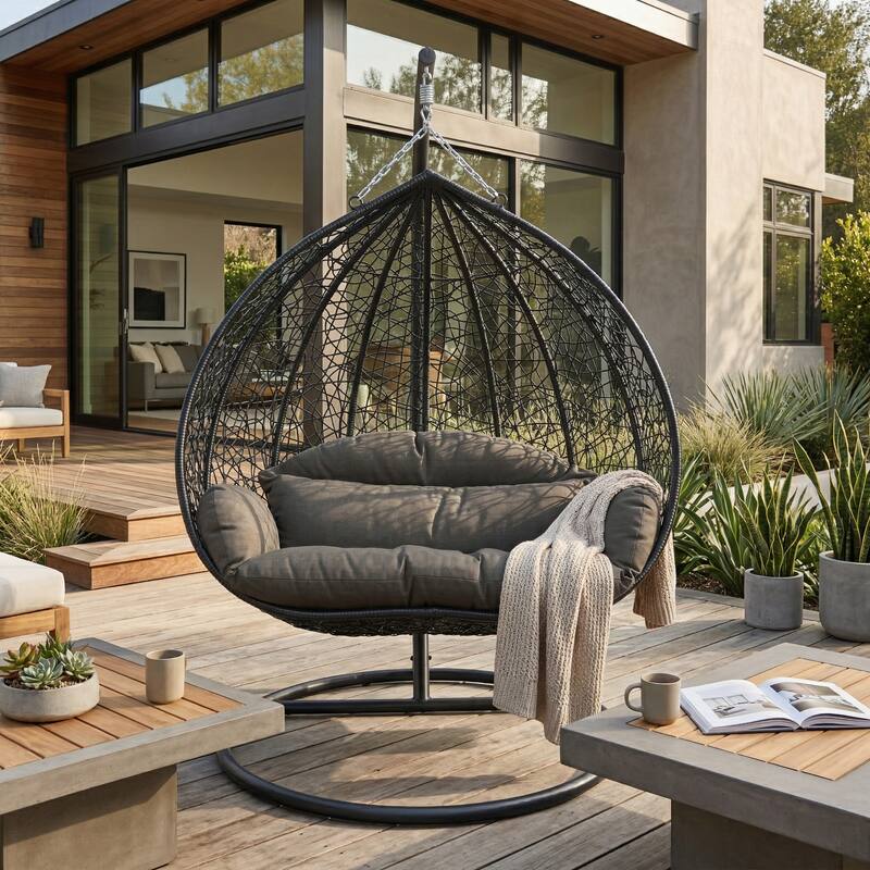 Angle. LeisureMod - Recluse Modern Wicker Teardrop Hanging Egg Chair with Stand - Heavy Duty, Outdoor Indoor Swing Chair & Cushion - Graphite Grey.