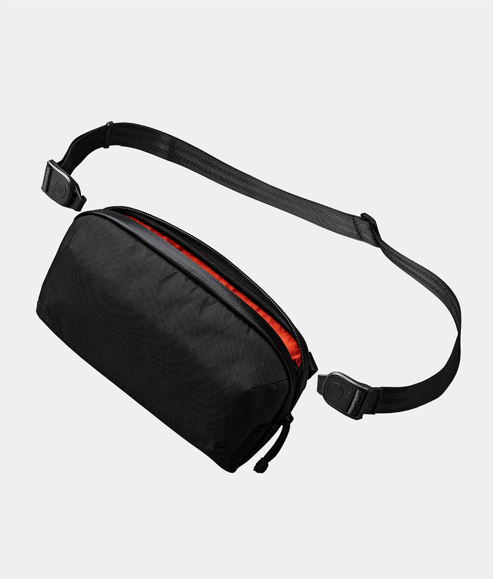 Front. ALPAKA - Flight Pouch Pro Passport Holder for Travel,Small Crossbody Bag for Men, phone holder bag,RFID sleeves for credit cards - Black X-Pac X42.