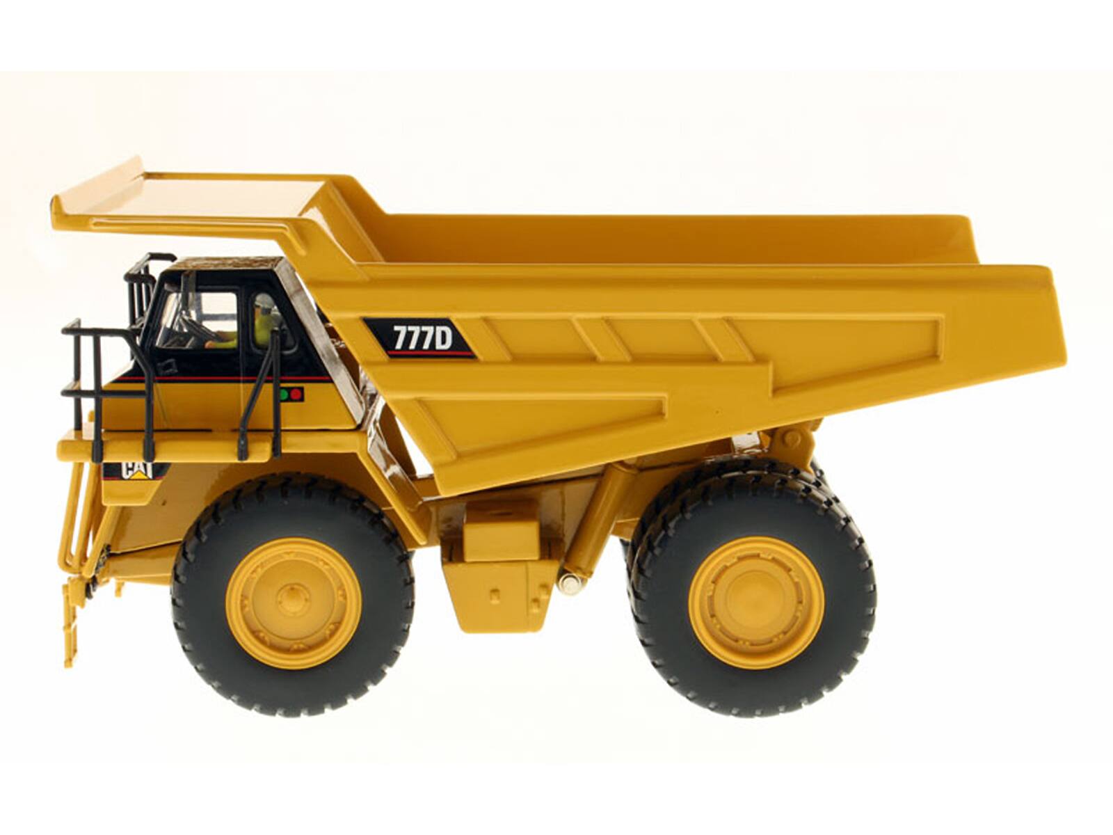 Angle. Diecast Masters - CAT Caterpillar 777D Off Highway Dump Truck with Operator "Core Classics Series" 1/50 Diecast Model by Diecast Masters - Yellow.