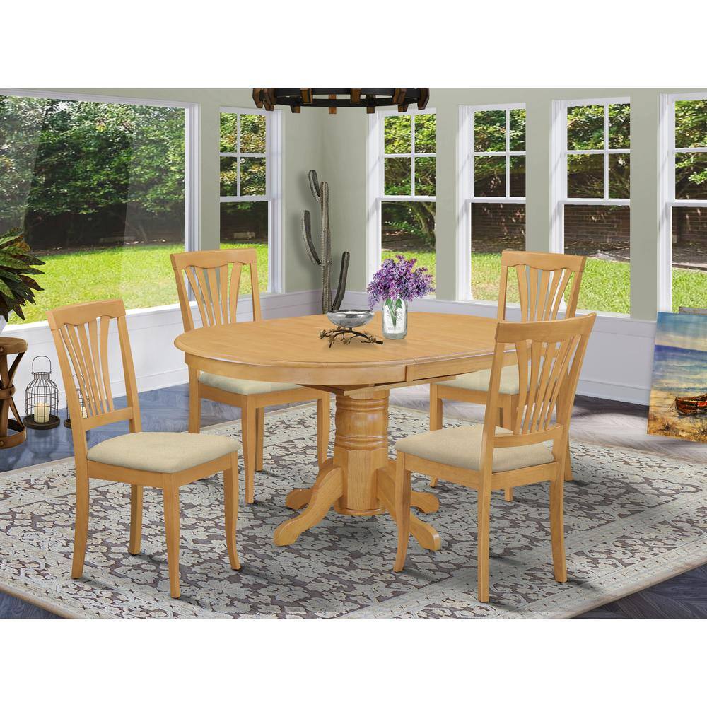 Left. East West Furniture - AVON5-OAK-C 5 Pc Dining room set-Oval Dining Table with Leaf and 4 Dining Chairs in Oak - Oak.
