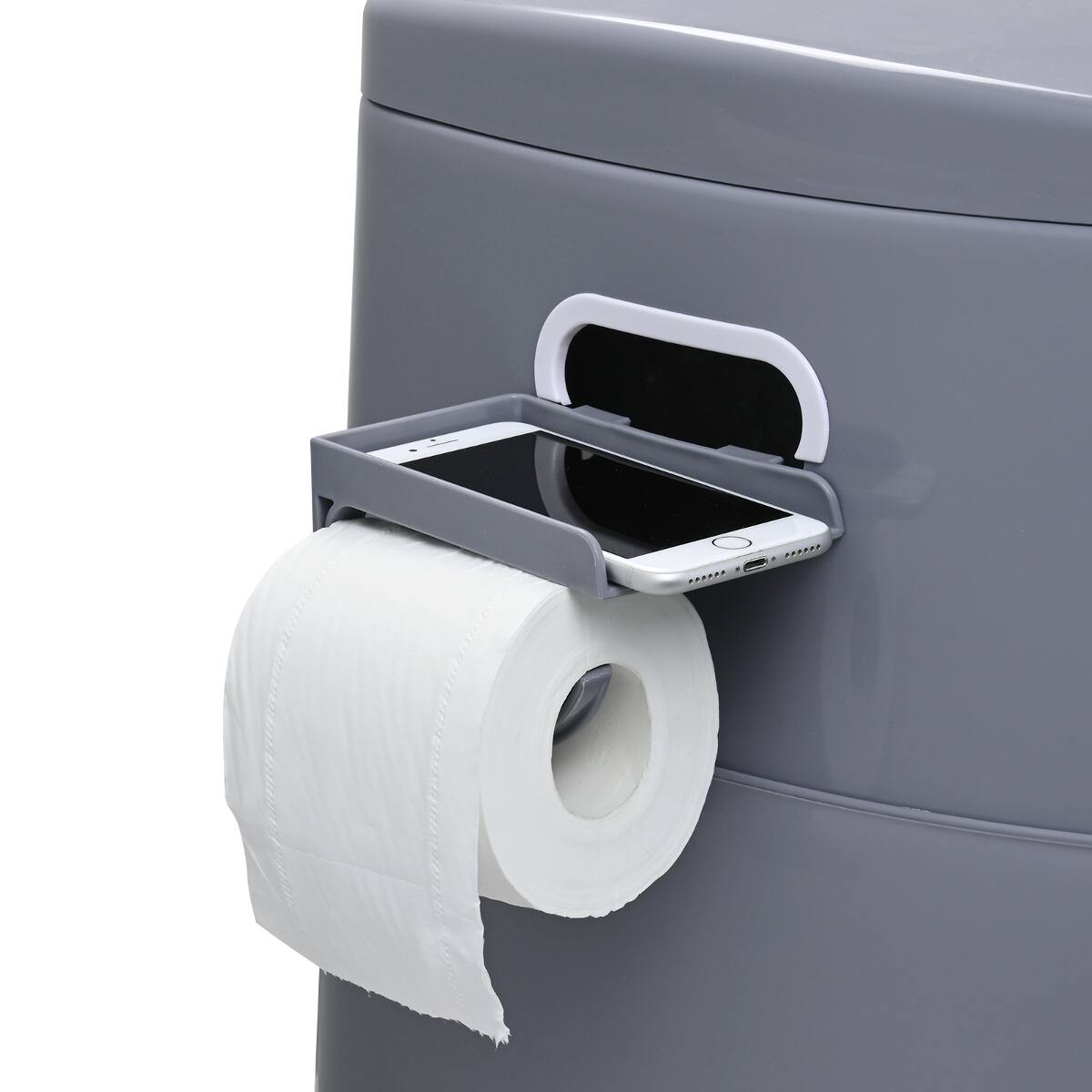 The image shows a gray trash bin with a white toilet paper holder attached to it. A roll of white toilet paper is mounted on the holder, and a smartphone is placed in a small compartment on the holder.