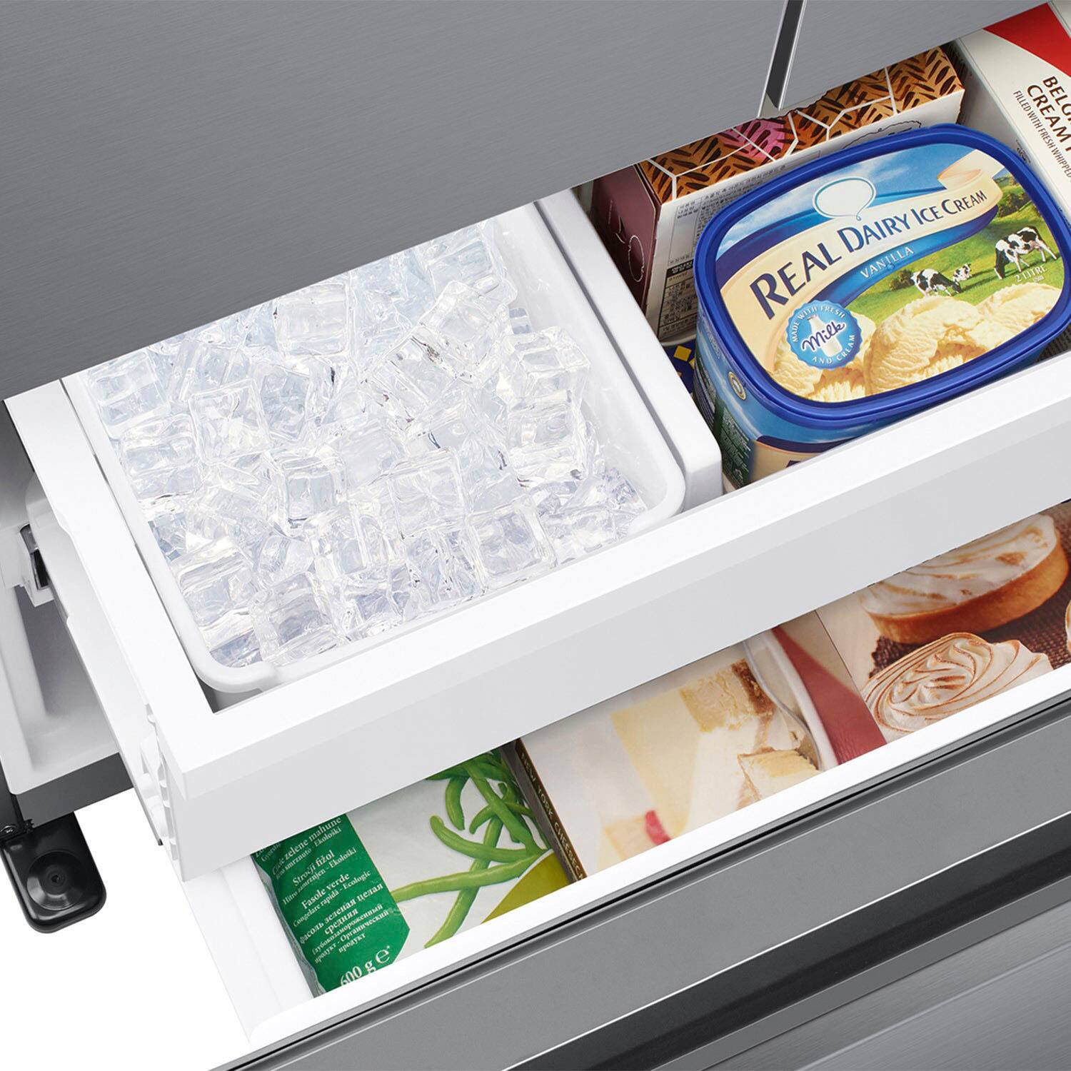 The image shows a refrigerator with its door open, revealing a variety of food items inside. There are several containers of ice cream, including a carton of vanilla ice cream, and a container of whipped cream. The refrigerator also contains a few books, possibly cookbooks or recipe books, which are placed in the bottom drawer. The assortment of food and books indicates that the refrigerator is well-stocked and organized for easy access and use.