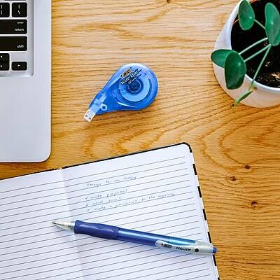 Sure, here is the corrected and grouped text:

---

**Things to do today:**

- Write a letter to my friend
- Finish the report for work
- Buy groceries for the weekend

---

**Items in the image:**

- Laptop
- Notebook
- Pen (BIC Cristal)
- Wite-Out tape dispenser
- Small potted plant