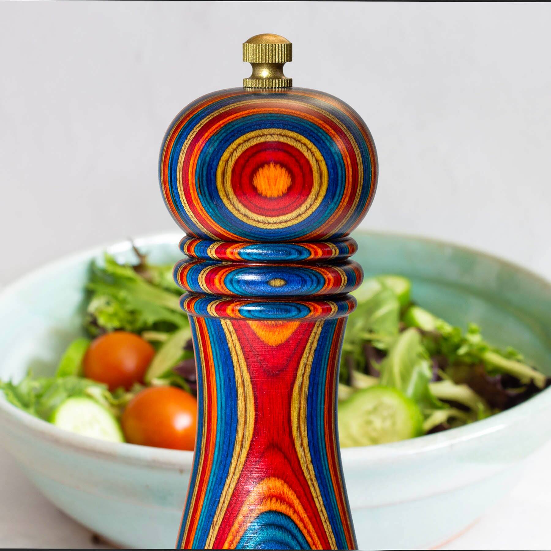 Left. Baltique - Montego Bay Collection Refillable Pepper Grinder - Blue, Orange, Red, Yellow.
