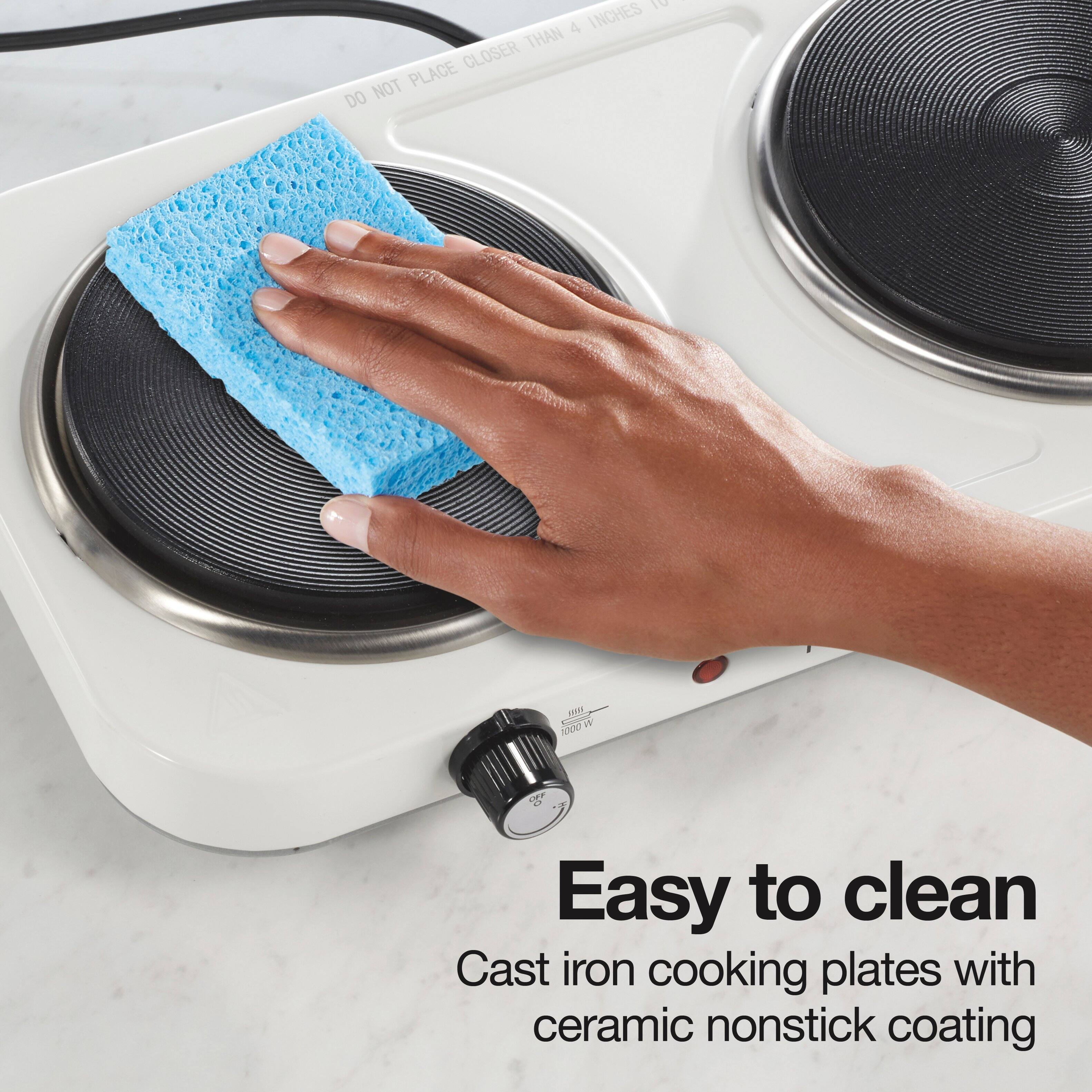DO NOT PLACE CLOSER THAN 4 INCHES TO

Easy to clean Cast iron cooking plates with ceramic nonstick coating