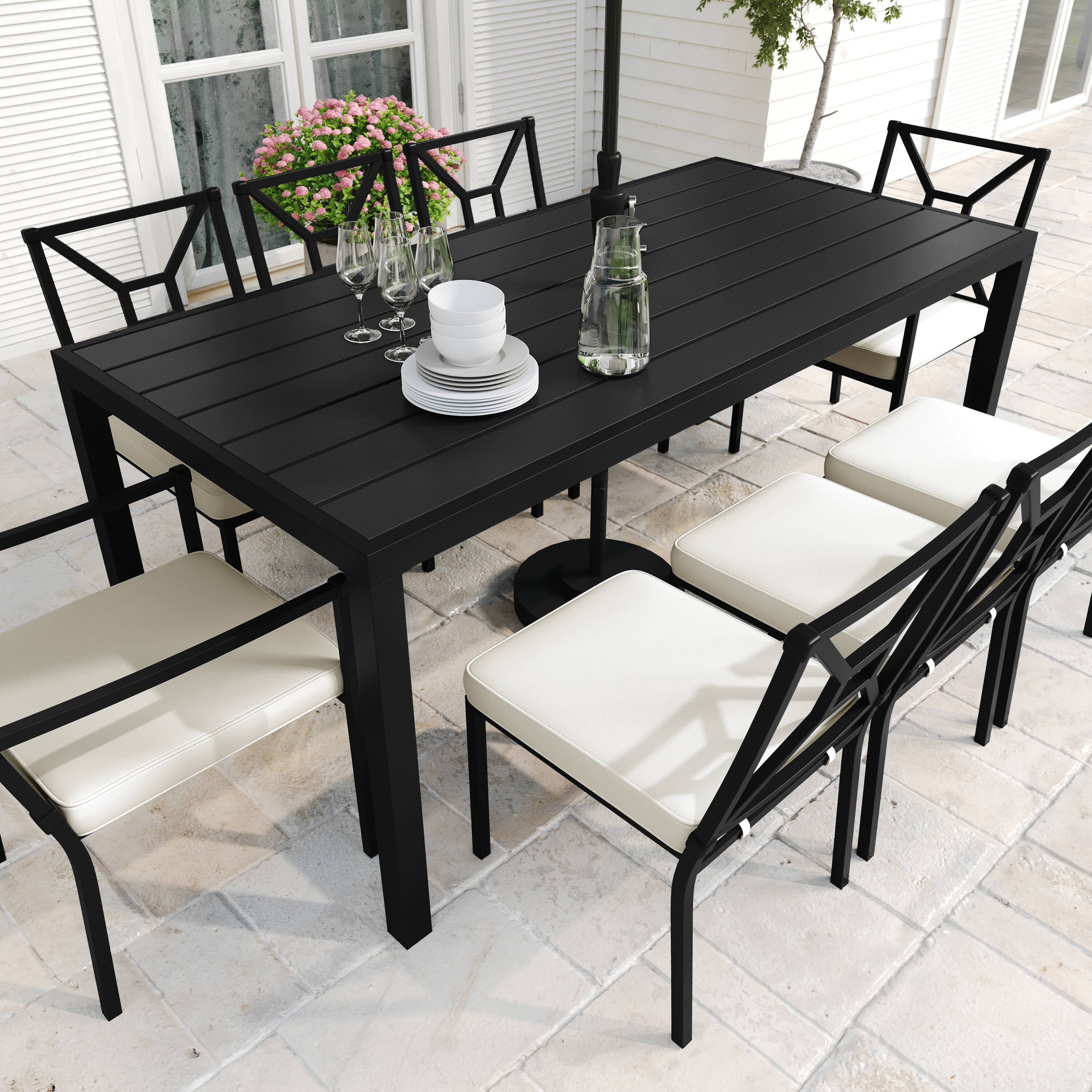 Alt View 4. Martha Stewart - Lily Pond 9-Piece Steel Patio Dining Set with 8 Stackable Chairs and 71" Table - Cream Cushions/Black Frame.