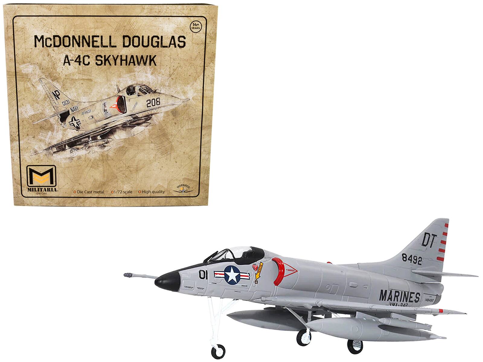 McDONNELL DOUGLAS  
A-4C SKYHAWK  

14+ TRAPS  
NP 3 NAVY  
I 208 02  
MILITARIA  
Ca Die Cast metal  
1/72 scale  
High quality  
DT 8492  
MARINES  
VUI-242  

DT  
8492  
MARINES  
VUI-242