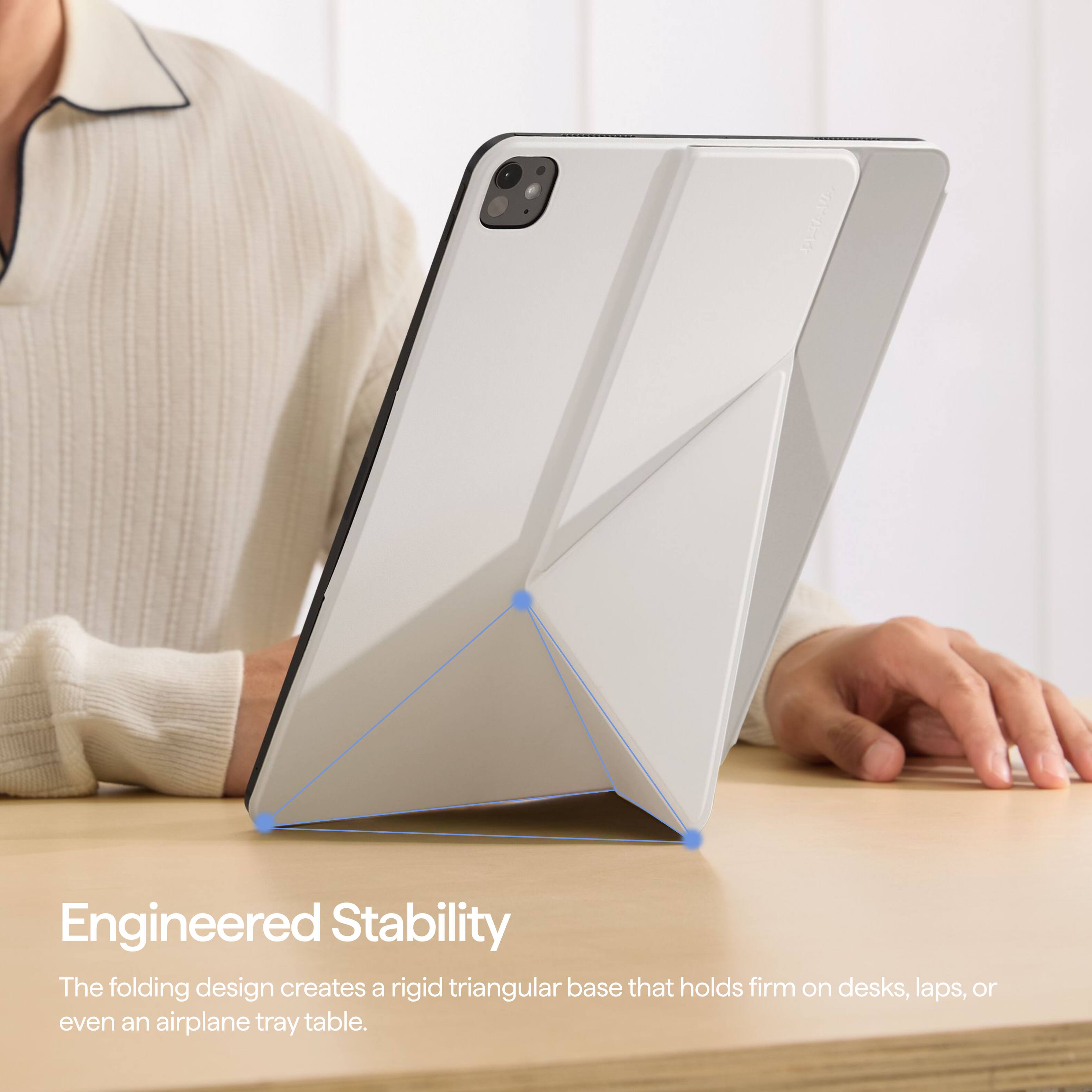 Engineered Stability  
The folding design creates a rigid triangular base that holds firm on desks, laps, or even an airplane tray table.