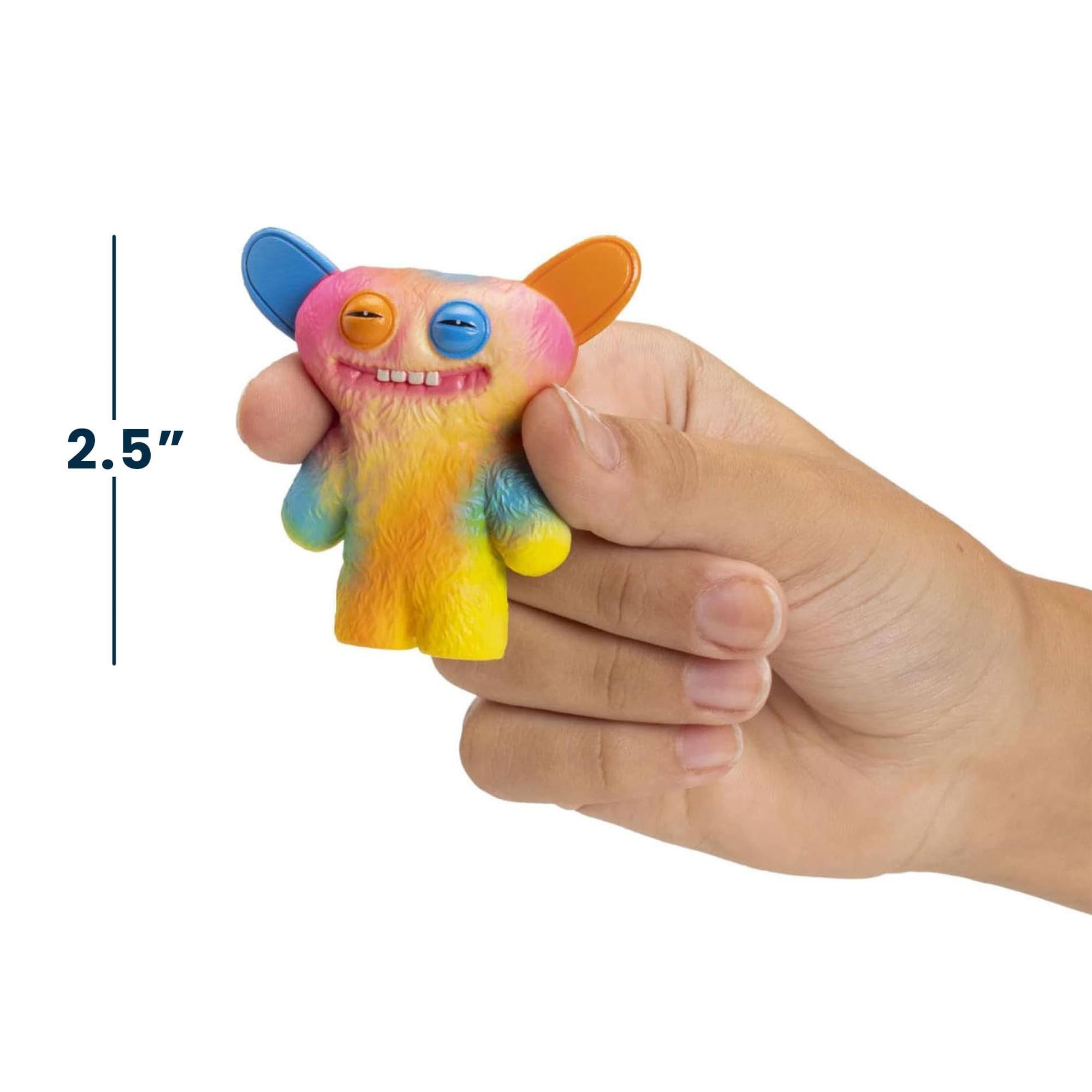 Alt View 5. ZURU - Fuggler 2.5 Inch Figure 3-Pack | Dark Green, Orange, Leopard Print - Multi-Colored.