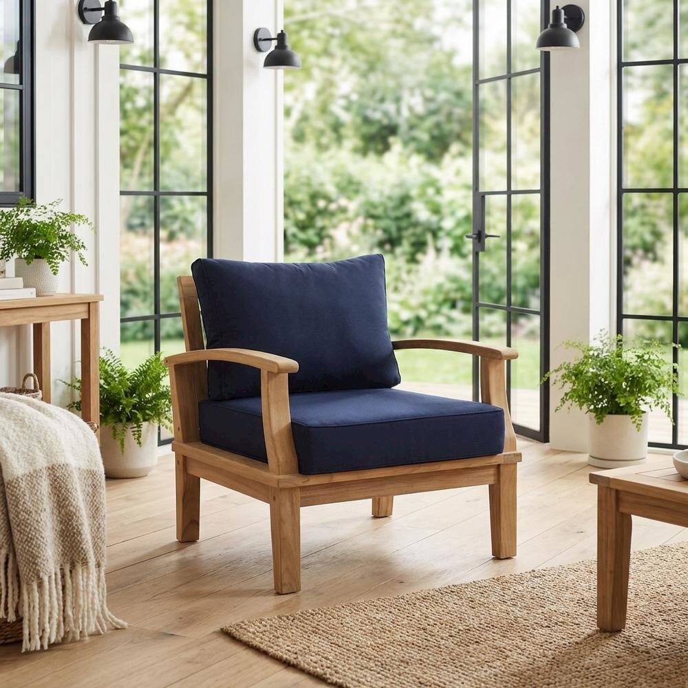 Angle. Outdoor Escape - Teak Outdoor Patio Armchair with Cushioned Seat and Classic Design - Blue.