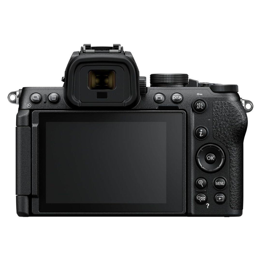 The camera has a display screen with a viewfinder and a menu button. The menu button is located on the right side of the display screen.