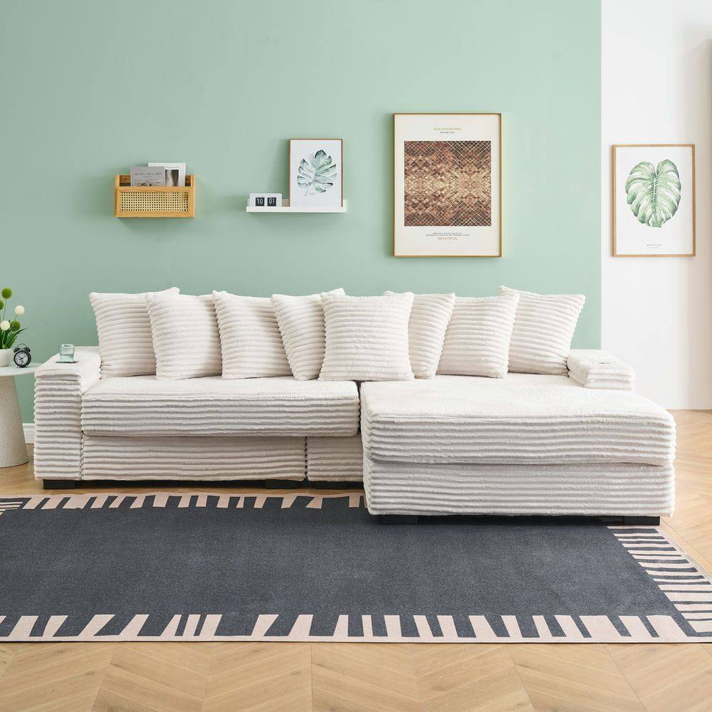 Left. Kadyn - 111.4" Modular Sectional with Reversible Chaise, Features Armrest Storage and Cup Holders, Beige - Beige.