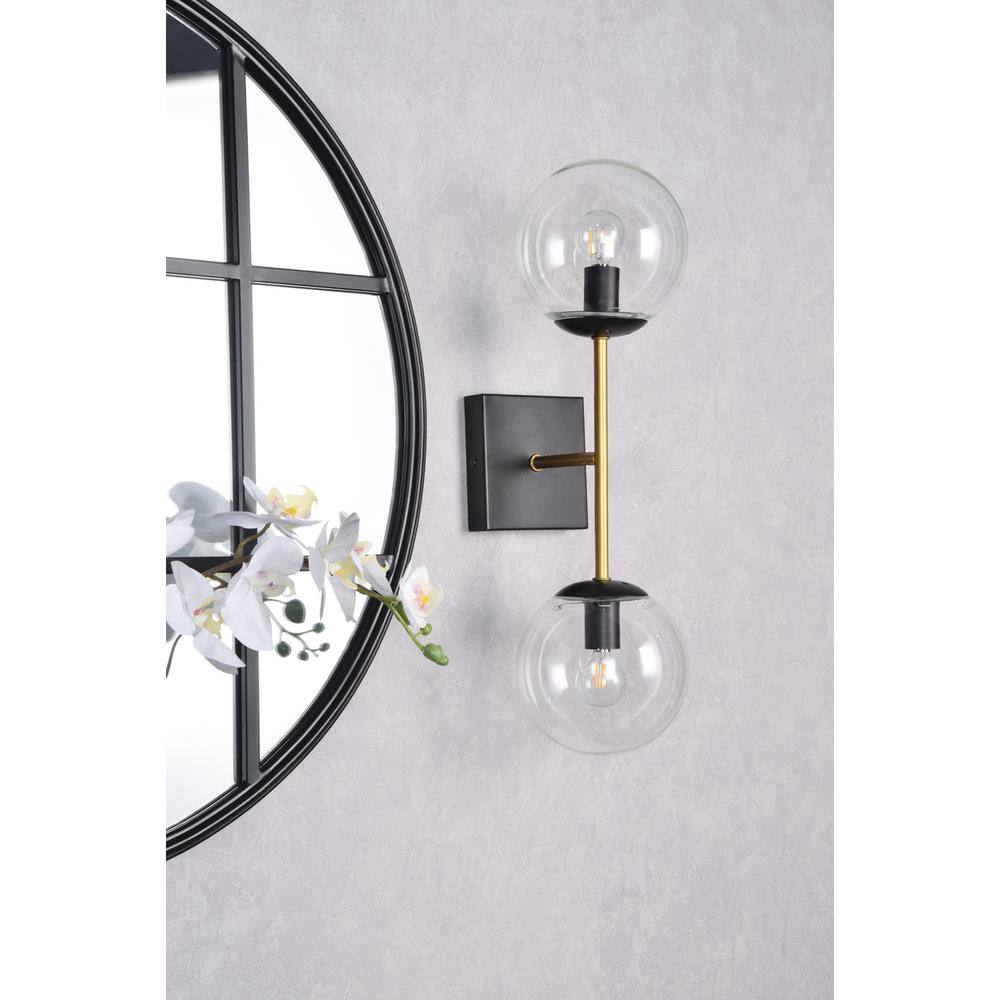 Angle. Living District - Neri 2 lights black and brass and clear glass wall sconce - Black And Brass And Clear.