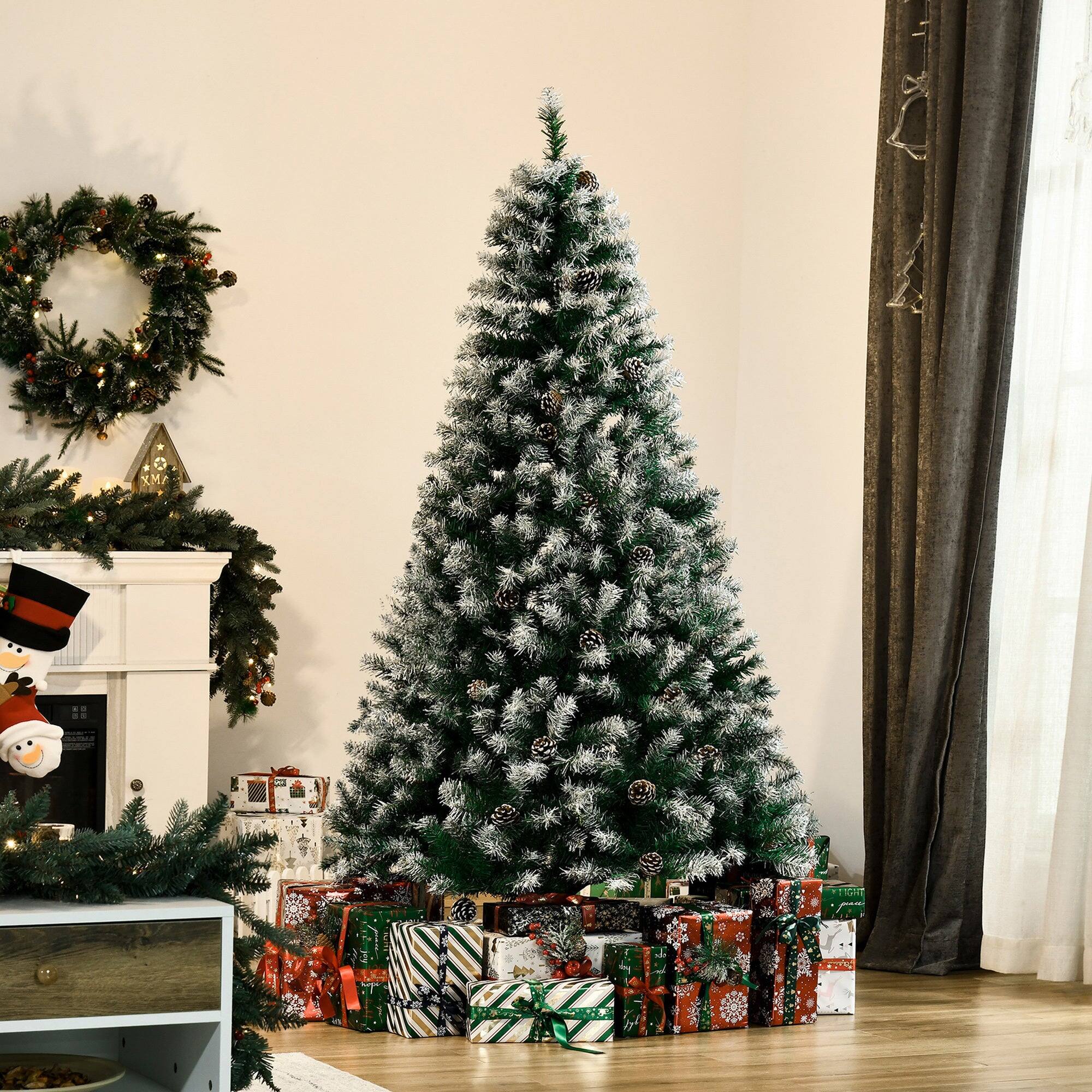 Angle. BreeBe - 6ft Unlit Snow-Dusted Full Fir Artificial Christmas Tree with Realistic Branches - Green.
