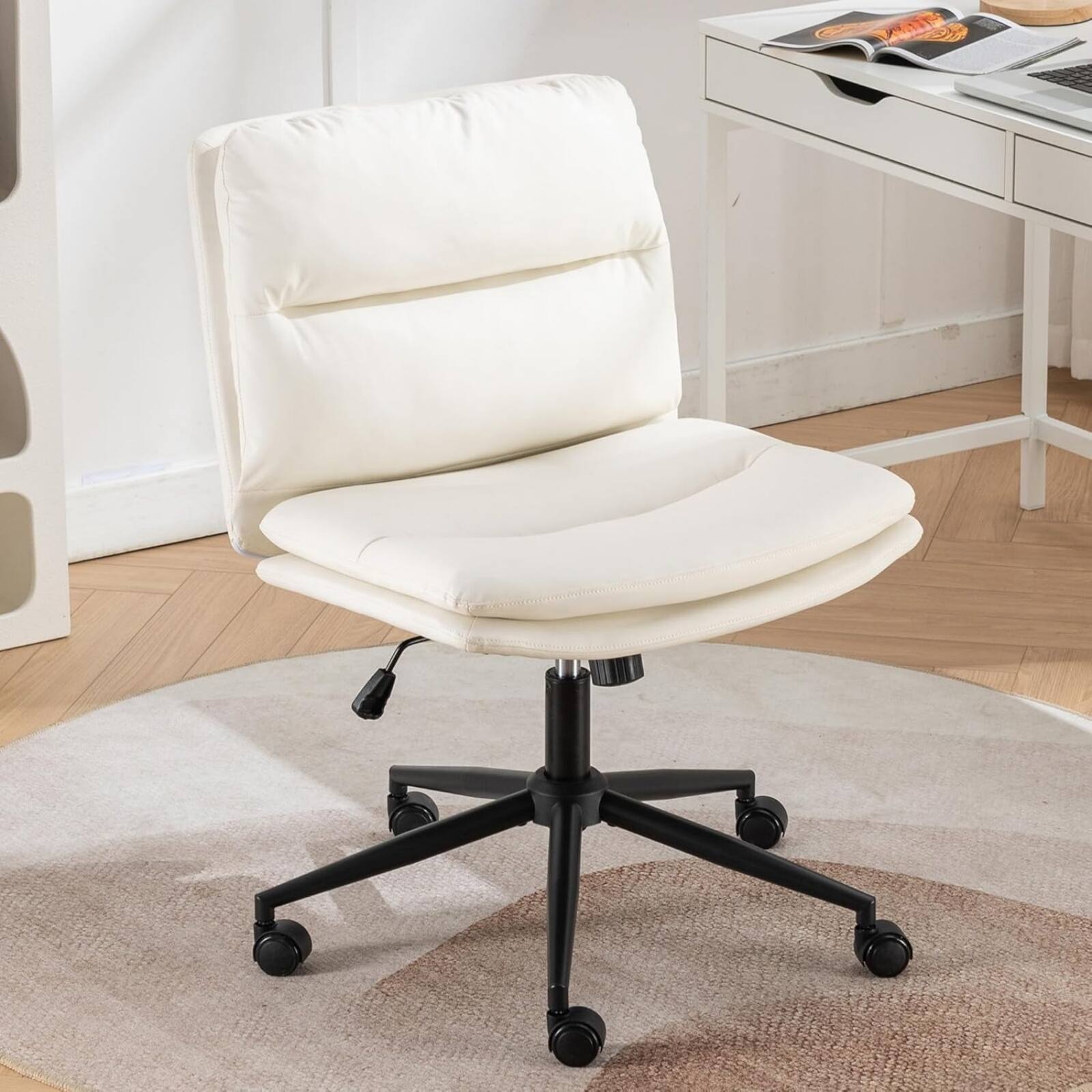 Angle. HTUTWOO - Modern PU Leather Armless Office Chair, Adjustable Height & 250lbs Capacity, for Home Office & Bedroom, Wheels Included - White.