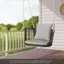 This rattan swing chair has a slightly higher front and lower back position after hanging, which is normal.