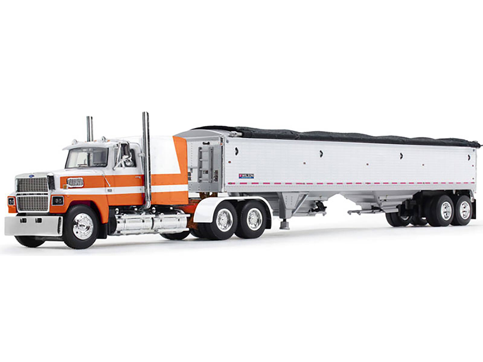 Angle. First Gear - Ford LTL 9000 60 Aerodyne Sleeper with Wilson Pacesetter Grain Trailer Orange and White 1/64 &  by DCP/First Gear - Orange and White.