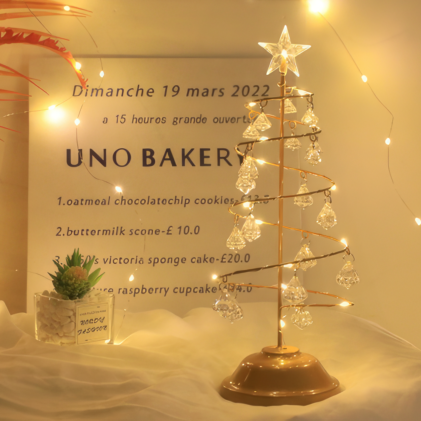 Dimanche 19 mars 2022  
à 15 heures grande ouverture  

UNO BAKERY  

1. oatmeal chocolate chip cookies - £2.50  
2. buttermilk scone - £10.0  
3. 60's victoria sponge cake - £20.0  
4. raspberry cupcake - £4.0  

Total: £36.50  

20CD 130008