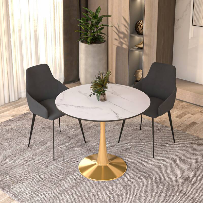 Angle. LeisureMod - Bristol Modern 35" Round Dining Table MDF/Sintered Stone Top - Pedestal Base for Kitchen, Cafe, and Restaurant - MDF - Marbled White.