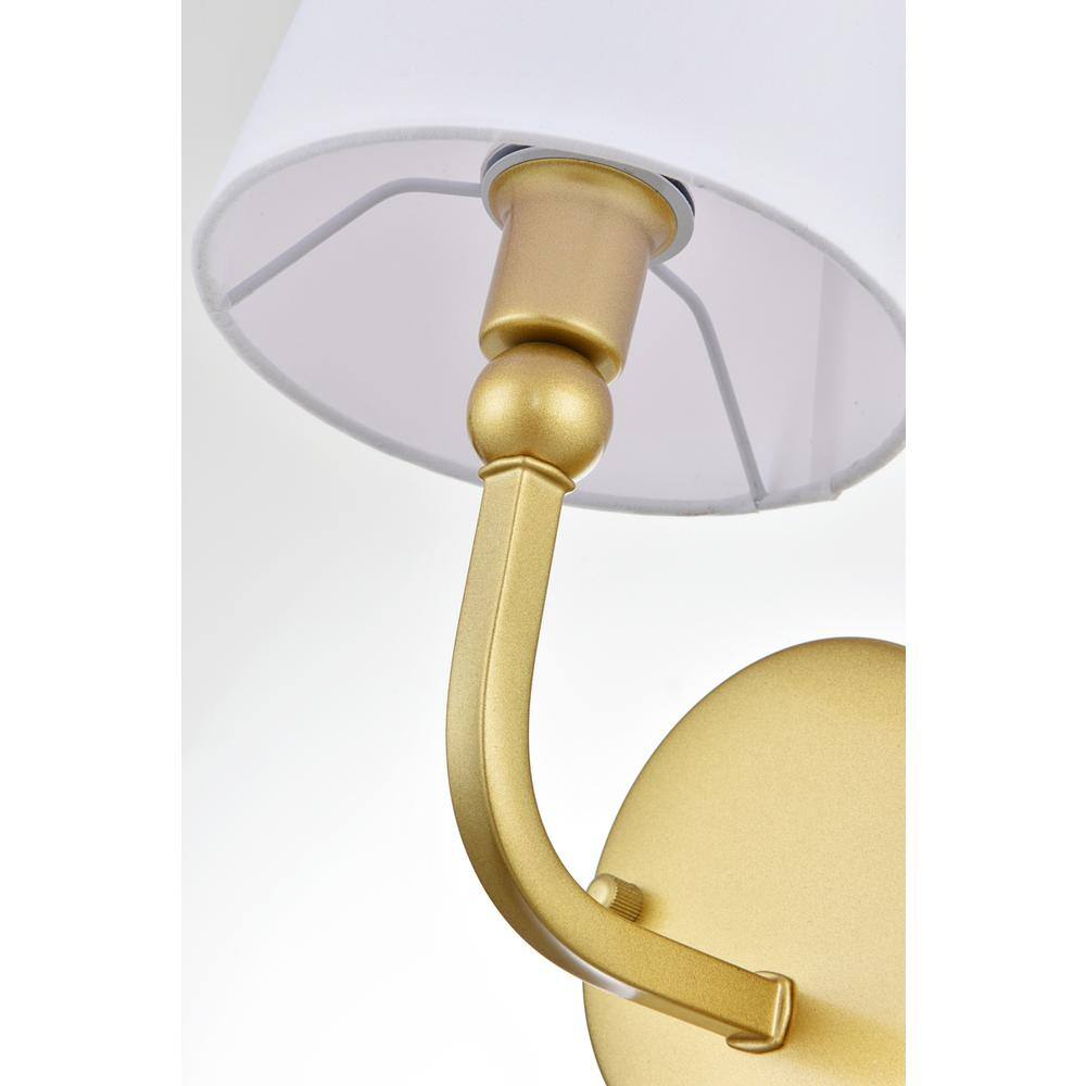 Angle. Living District - Colson 1 light Brass and Clear Bath Sconce - Brass And Clear.