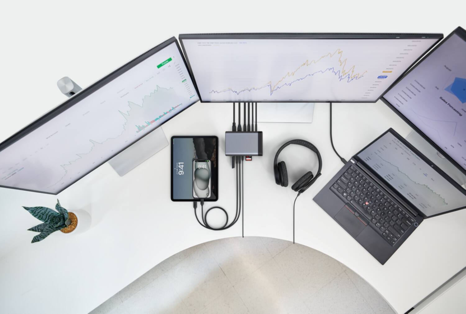 The text on the image reads "Forcasting 1 9:41 941 . . . . & - . d O A." However, it seems to be a random combination of letters and numbers without any coherent meaning. Therefore, it is not possible to group or correct the text based on the given information.