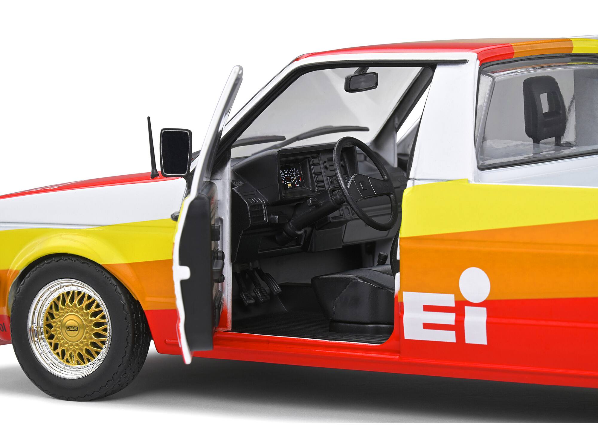 Left. Solido - 1982 Volkswagen Caddy MK 1 Pickup Truck "Kamei Tribute" 1/18 Diecast Model Car by Solido - Multi.