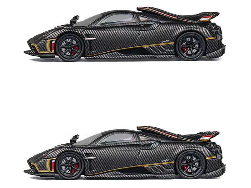 Angle. CM Models - Pagani Imola Black Carbon with Red and Gold Stripes with Extra Wheels 1/64 Diecast Model Car by CM Model - Black.