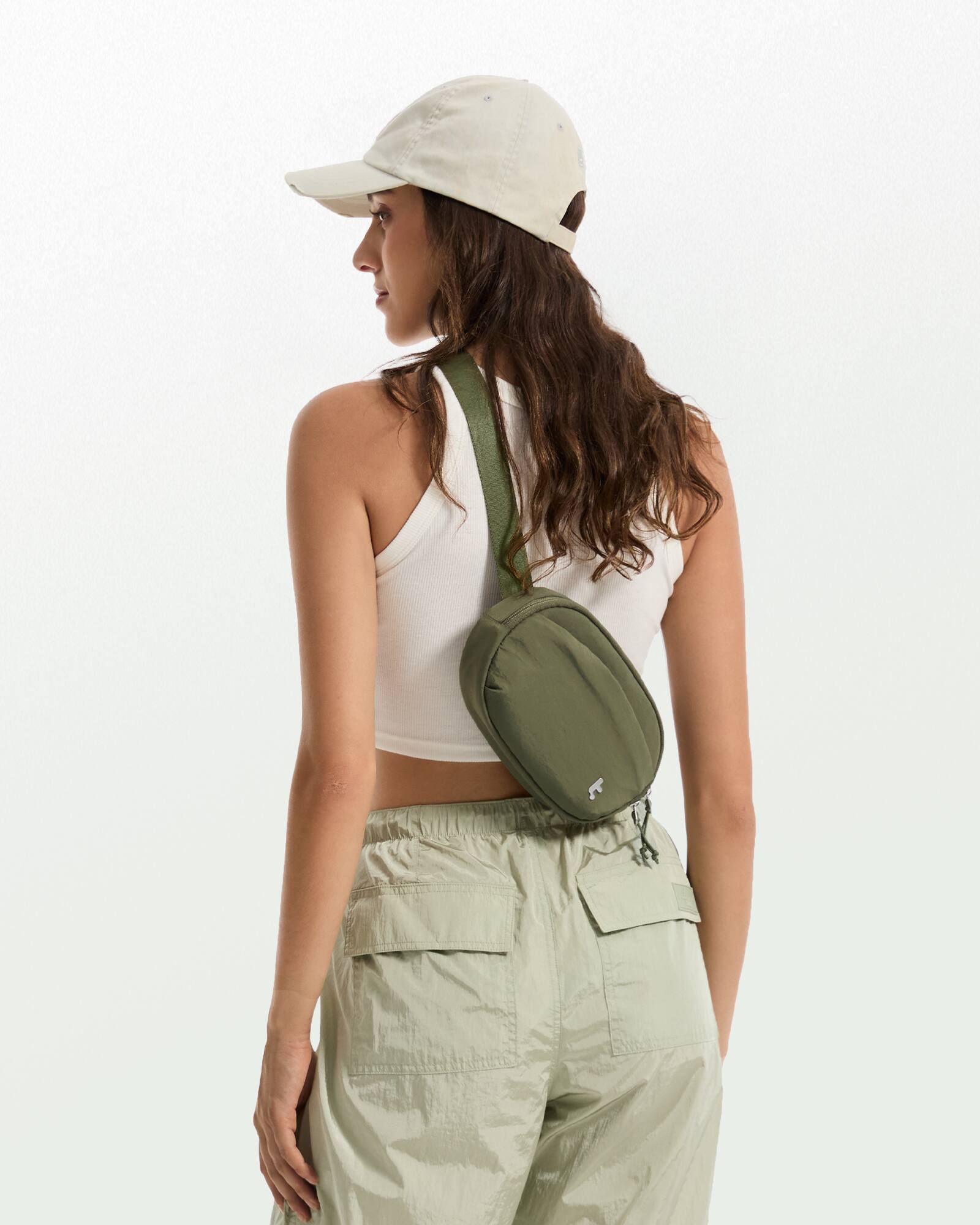 Alt View 17. tomtoc - SlingBean-T32 1.5L Sling Bag with RFID Blocking, Belt Bag Fanny Pack Waist Bag Crossbody Bag for Travel, Everyday - Green.