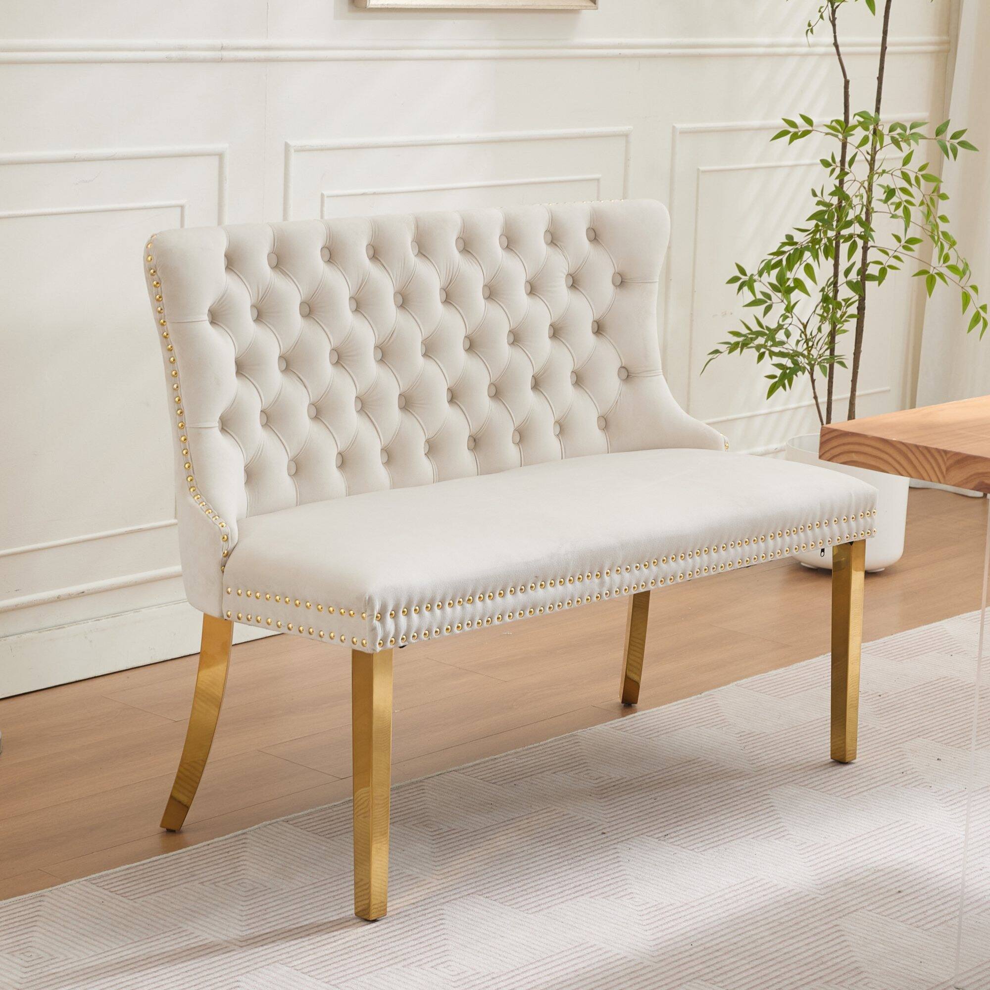 Angle. GOODSILO - Velvet Tufted Double Seater Dining Bench with Gold Accent Legs for Kitchen and Dining Room Seating - Beige.
