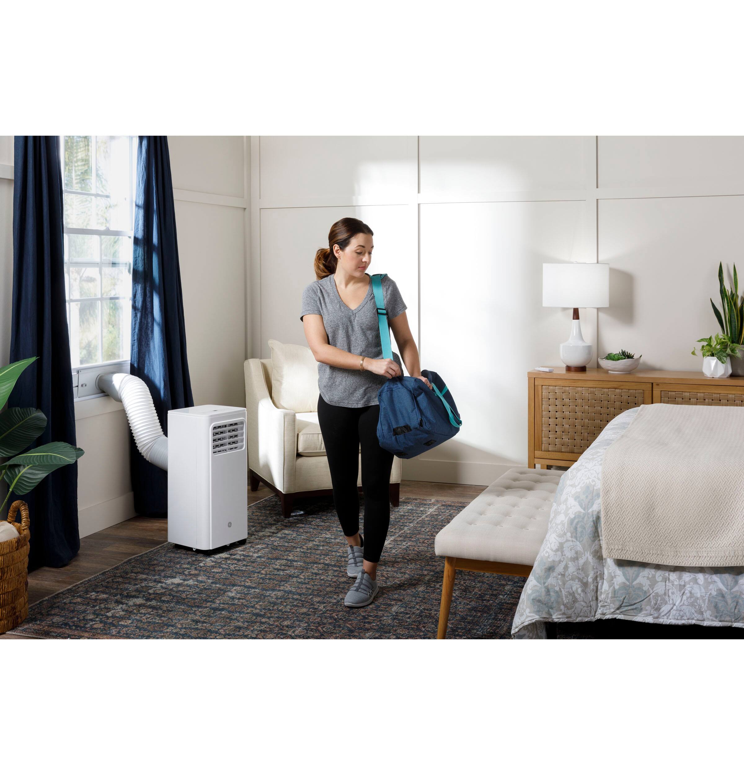 Alt View 12. GE - 250 Sq. Ft. 6,000 BTU Portable Air Conditioner with Auto Evaporation Technology - White.