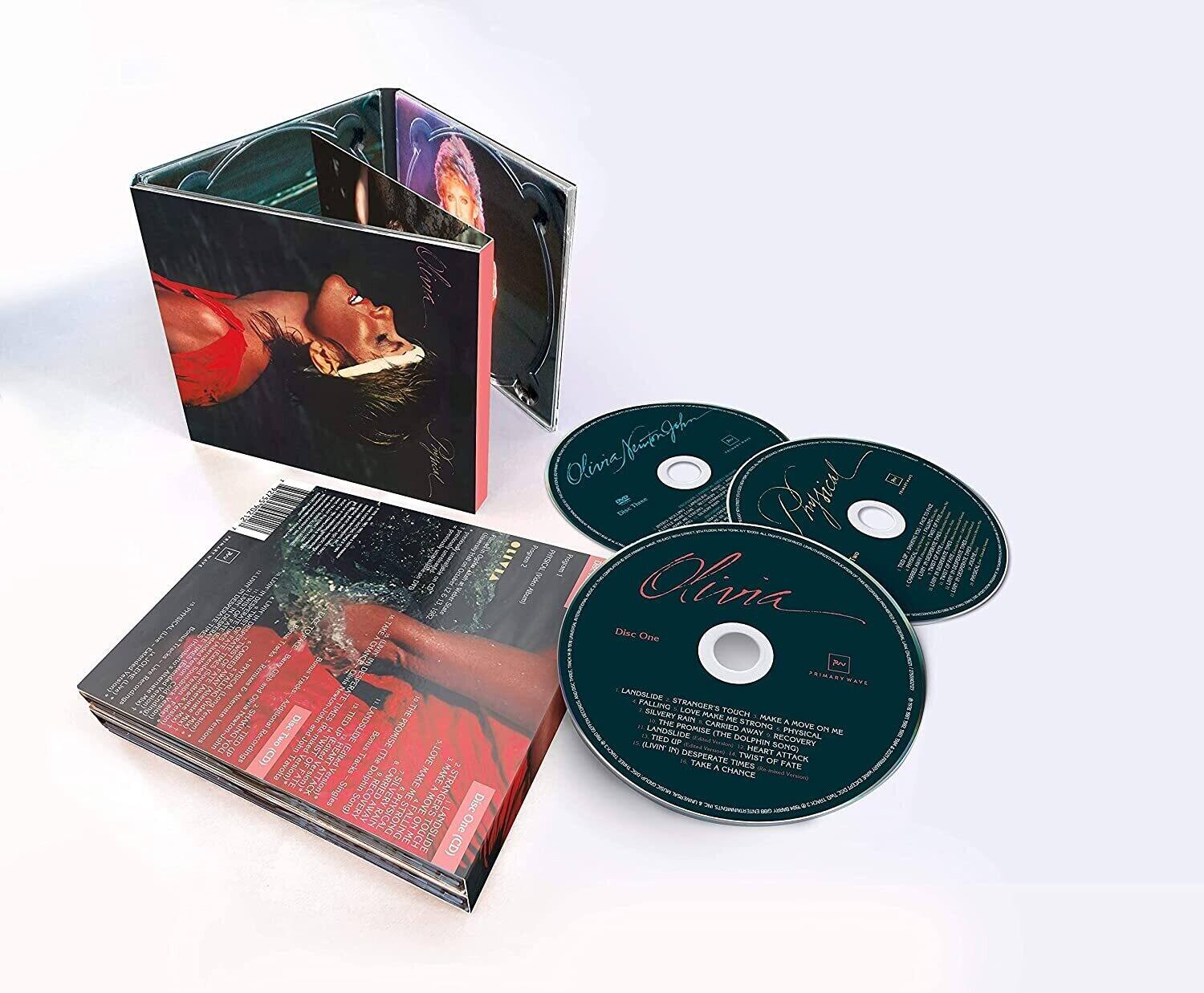 Sure, here is the corrected and grouped text from the image:

**Disc One:**
1. Landslide
2. Strangers Touch
3. Make One Move On Me
4. Falling Down
5. One Stay
6. Late Dance
7. Dolphin
8. Recovery
9. Learn In Desperate
10. Take A Chance
11. Heart Attack

**Disc Two:**
1. Physical
2. One Touch
3. Olivia
4. One Je
5. Primastwave
6. Landslide
7. Strangers
8. Silmery Love
9. Mare Too
10. The Rat
11. Make A Landslide
12. Promie
13. Carried Strong
14. Move On
15. Ithe Anisn

**Album Title:**
Olivia

**Additional Text:**
- "Olivia" (signature on the CD)
- "Disc One" (on the CD)
- "Disc Two" (on the CD)
- "Olivia" (on the booklet and CD)
- "Olivia" (on the booklet and CD)
- "Olivia" (signature on the booklet)

**Booklet Text