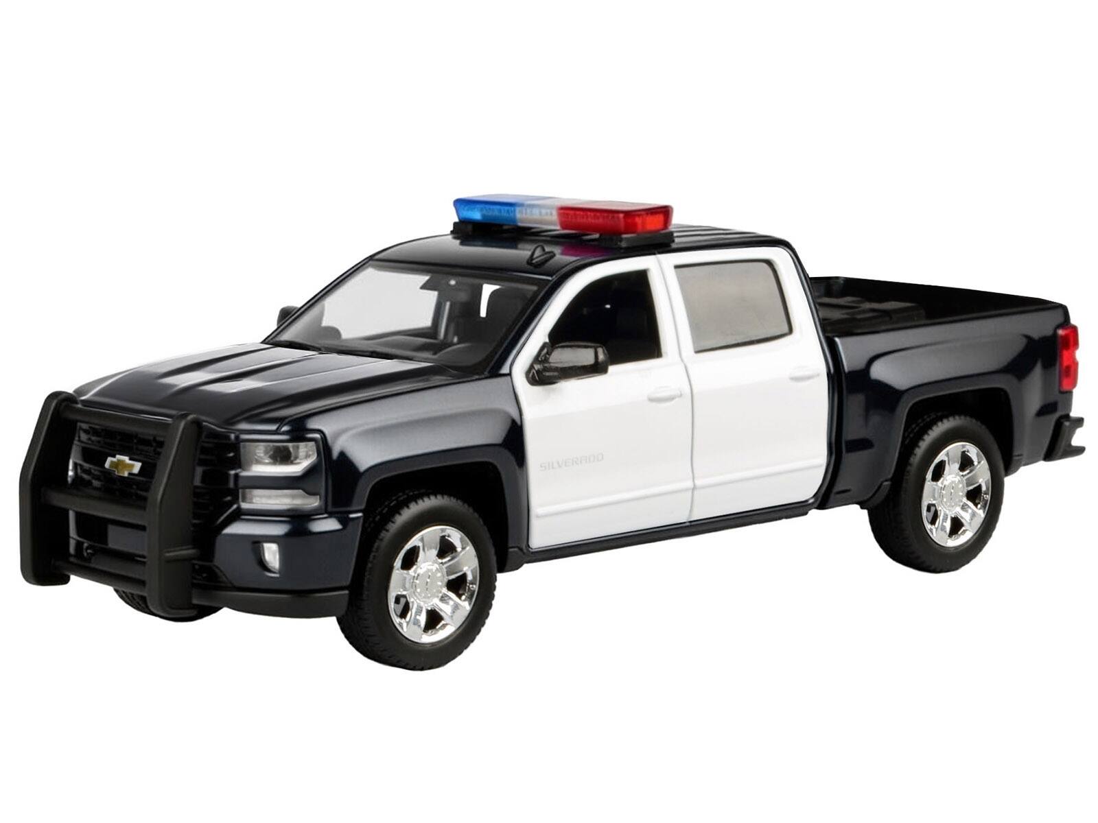 Alt View 1. Motormax - 2017 Chevrolet Silverado 1500 LT Z71 Crew Cab Truck Black and White with Lights and Sounds 1/27 Model Car by Motormax.