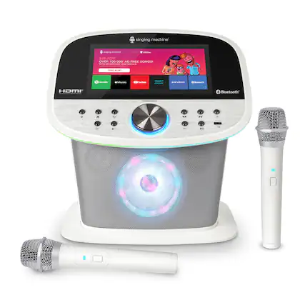 The image features a singing machine with a singing matinee, which allows users to enjoy over 1,000 ad-free songs. The machine is equipped with a microphone and a speaker, making it a versatile and entertaining device. The microphone is placed next to the machine, and the speaker is located on the side of the machine. The singing machine is designed to provide an enjoyable and interactive music experience for users.