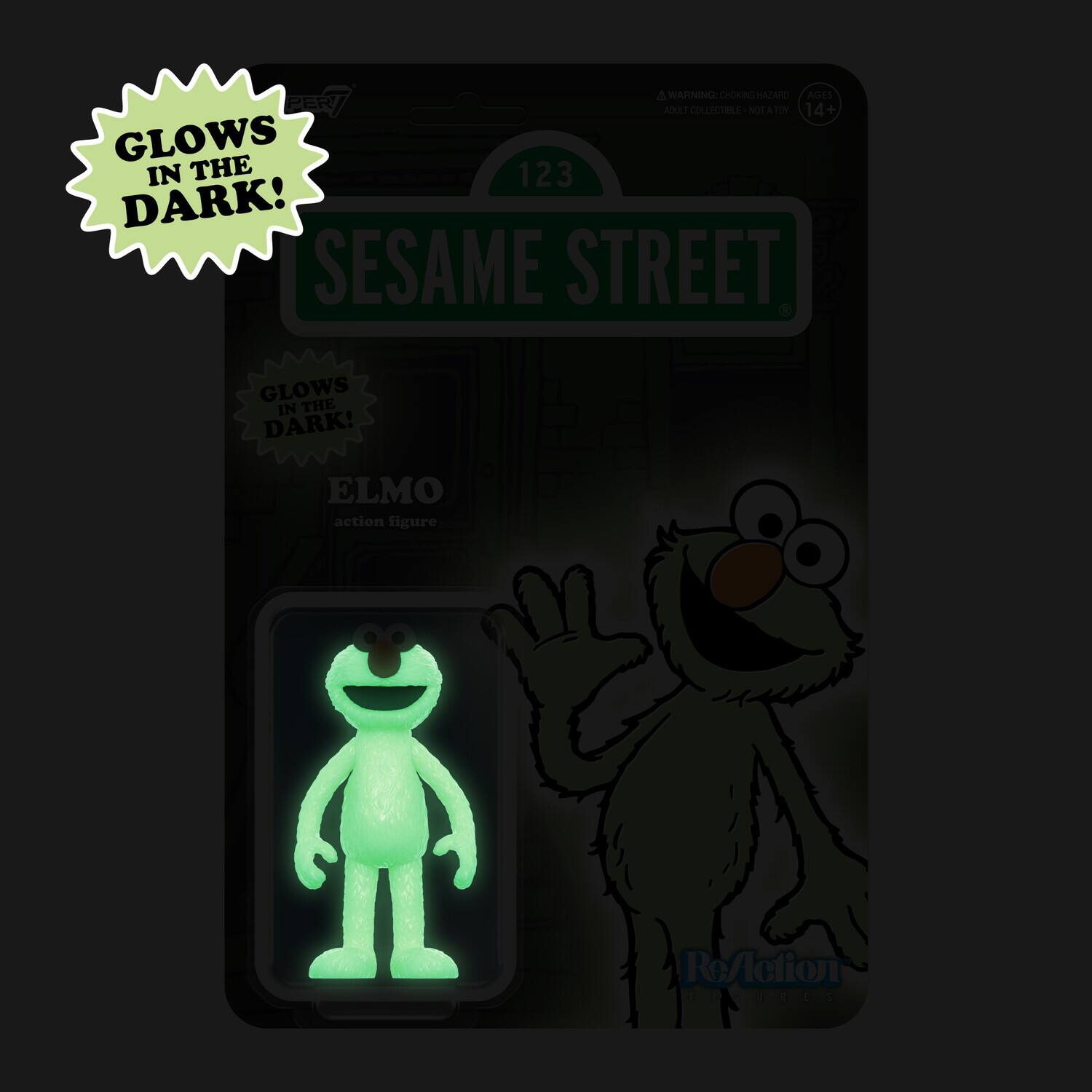 A WARNING: CHOKING HAZARD - ADULT COLLECTIBLE - NOT FOR TODDLERS. AGES 14+. GLOWS IN THE DARK! SESAME STREET ELMO action figure.