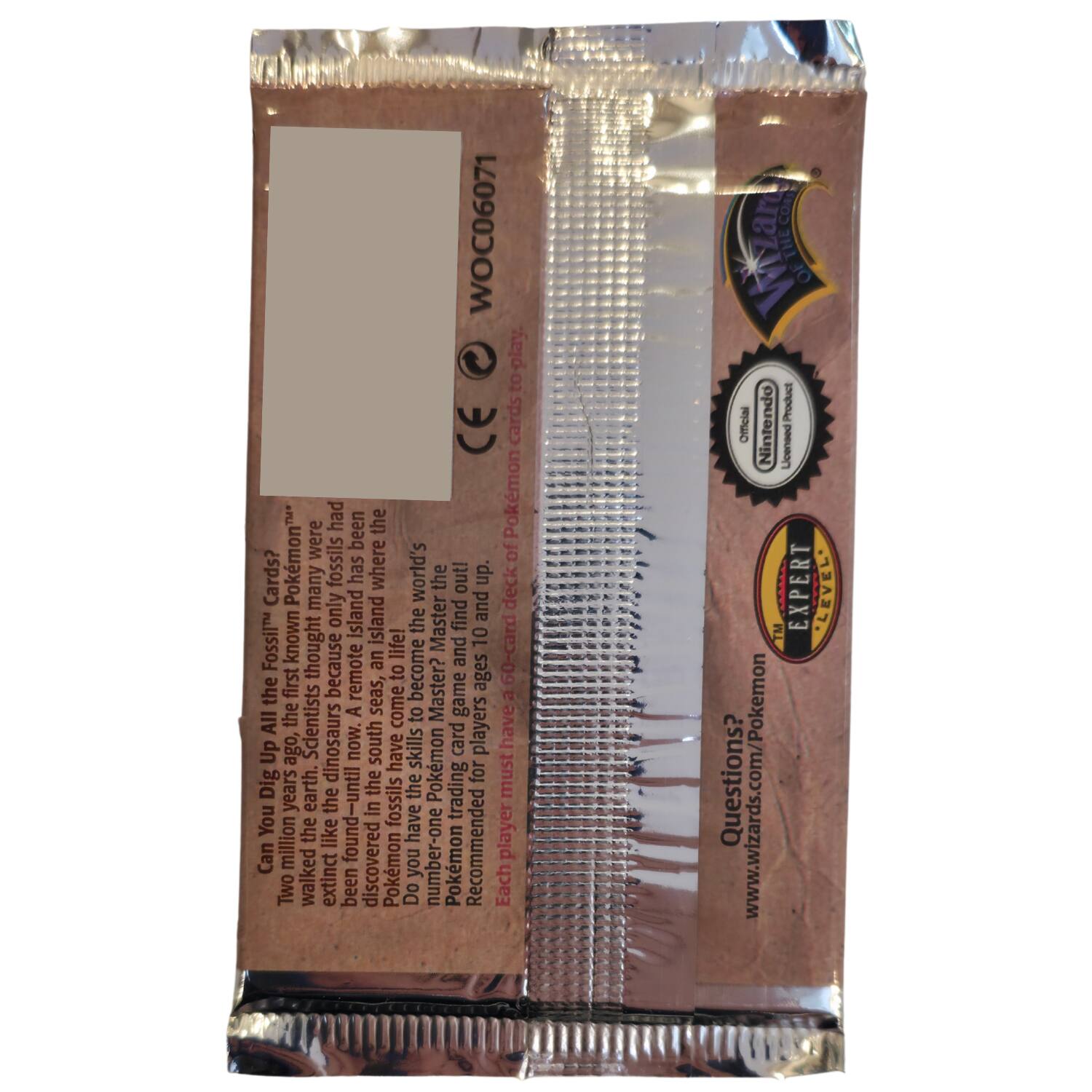 Sure, here is the corrected and grouped text from the image:

---

**Official Nintendo Licensed Product**

**EXPERT LEVEL™**

**Questions?**  
www.wizards.com/Pokemon

**Can You Dig Up All the Fossils?**  
Two million years ago, the earth was like the dinosaur's first known habitat. Dinosaurs roamed the earth until the dinosaurs became extinct. Scientists believe that the dinosaurs were wiped out by a massive asteroid impact. The Pokémons™ that were discovered in the fossilized remains of the dinosaurs are known as Fossil Pokémon. Each player must find and collect all the Fossil Pokémon cards. The player who collects the most Fossil Pokémon cards wins. The Fossil Pokémon cards are rare and hard to find. The player who collects the most Fossil Pokémon cards wins. The Fossil Pokémon cards are rare and hard to find. The player who collects the most Fossil Pokémon cards wins. The Fossil Pokémon cards are rare and hard to find. The player who collects the most Fossil Pokémon cards wins. The Fossil Pokémon cards are rare and hard to find. The player who collects the most Fossil Pokémon cards wins. The Fossil Pokémon cards are rare and hard to find. The player who collects the most F