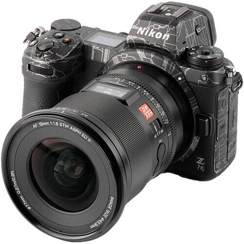 OSI  
Nikon  
$ T M S  
ut  
16/18 AF 18mm 1:1.8 STM ASPH ED 0.27m/0.9ft 77mm SIZE IMAGE 3mm 43.3mm  
9 OF RBW FILM  
YIU Z 7)