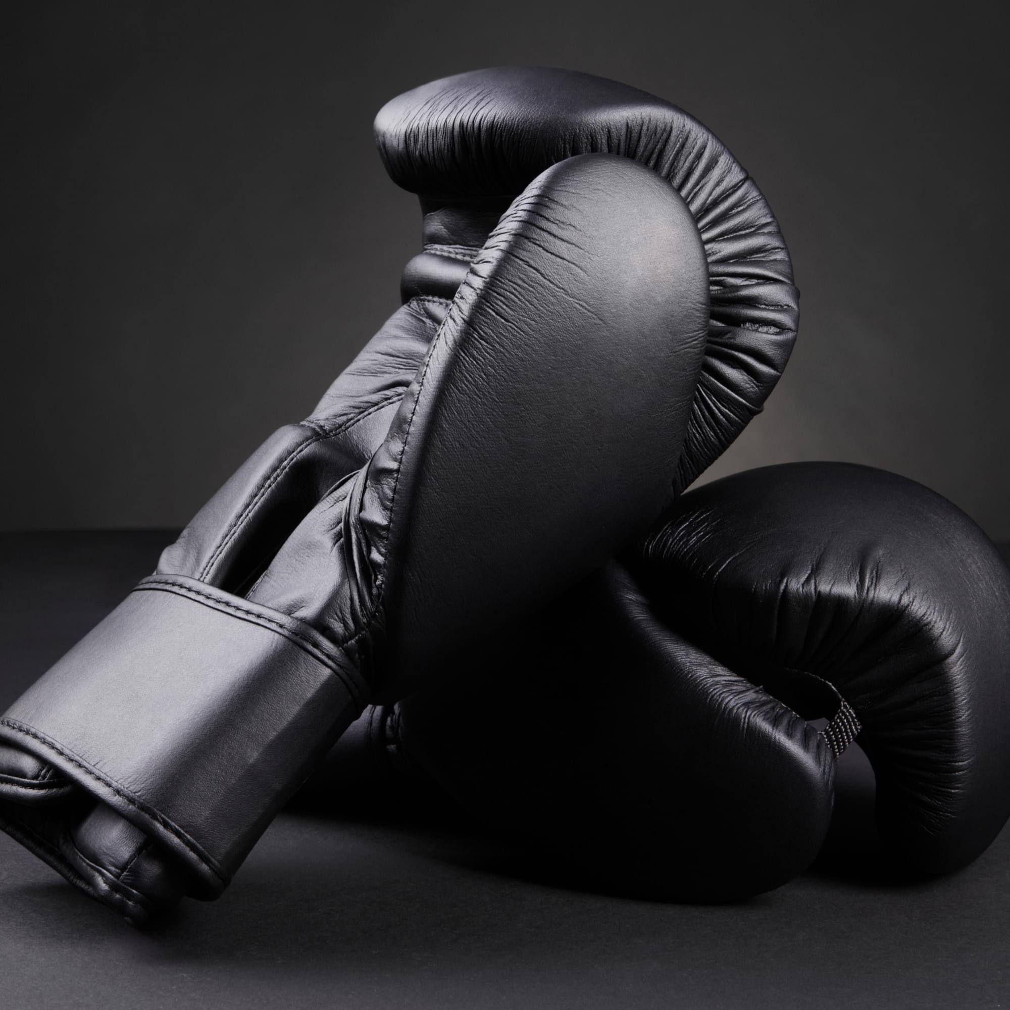 Alt View 1. Underwraps - Black Boxing Gloves Adult Costume Accessory | OS - Black.