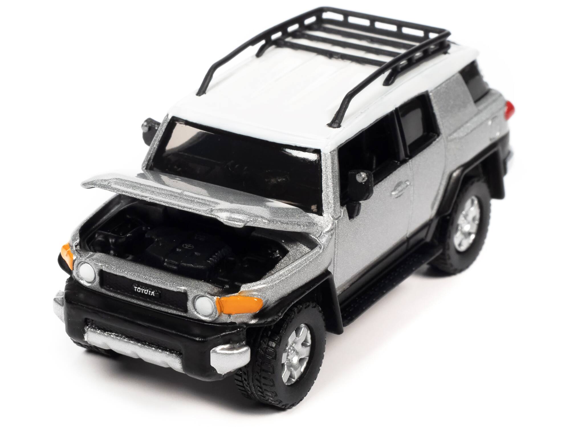 Angle. Johnny Lightning - 2007 Toyota FJ Cruiser Titanium Silver Metallic White Top Roofrack 1/64 Diecast "Classic Gold Collection" - Silver Metallic With White.