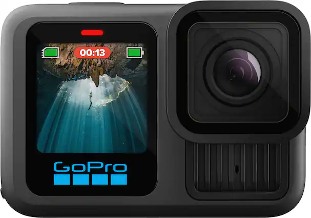 The image shows a black GoPro camera with a screen displaying the time of 00:13. The camera is likely being used to capture a video or take a photo.