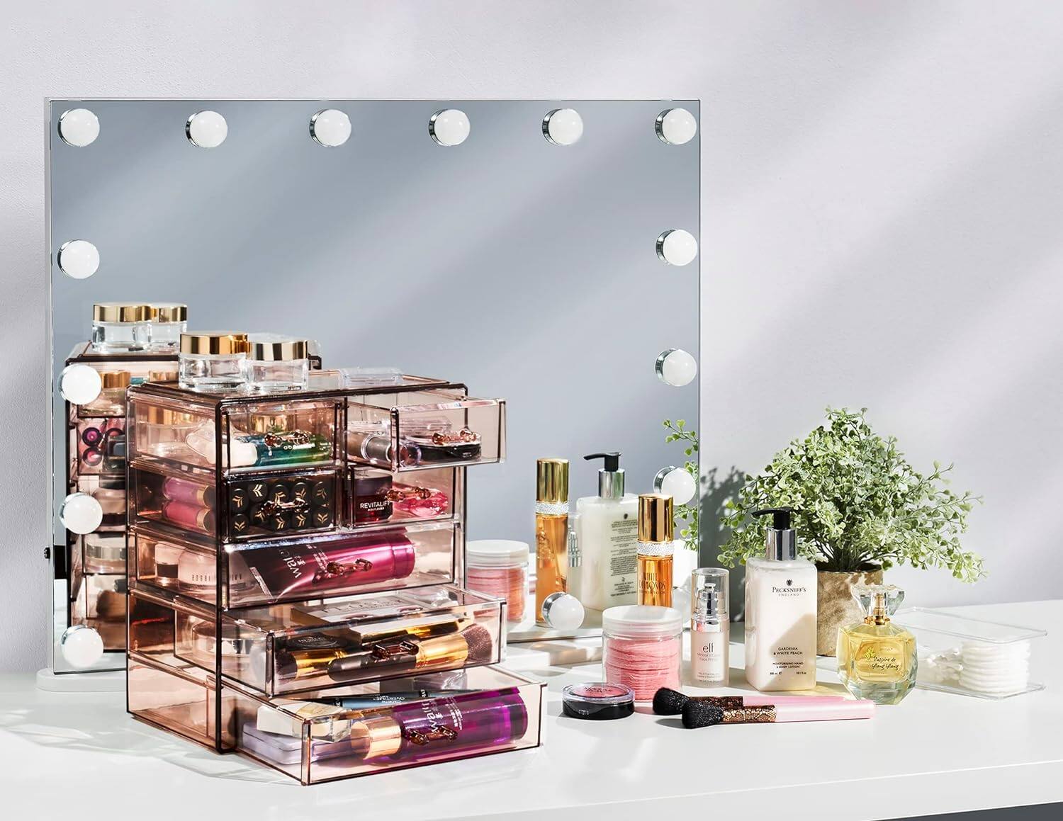 The text in the image reads:

- "REVITALIFT"
- "PICKNEY'S"
- "GARDENIA"
- "Eau de Parfum"