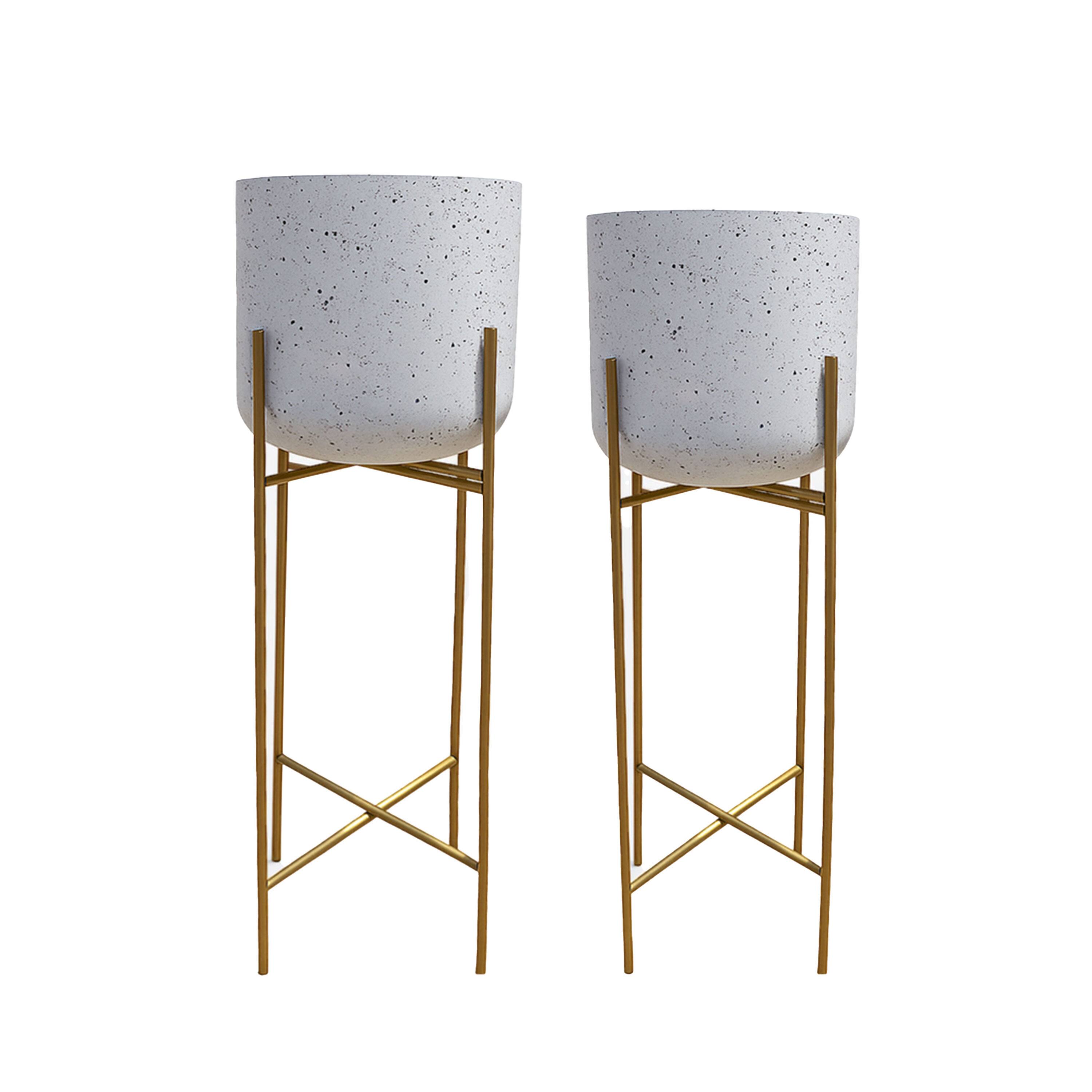Front. Manhattan Lane - Aira Set of 2 Planters | 20, 22" Tall | Gold Foldable Metal Stand | White Speckled Pattern.